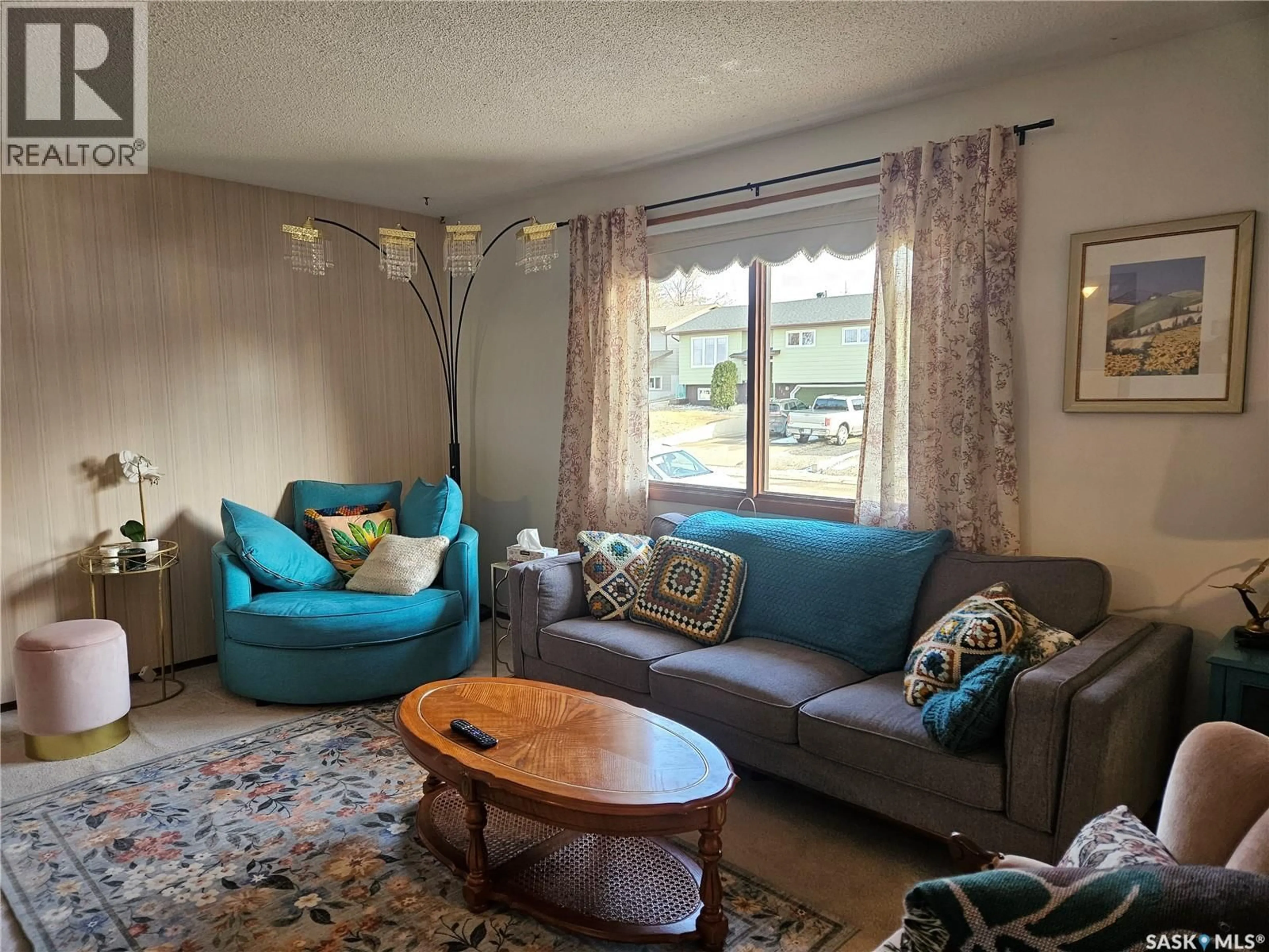 Living room with furniture, unknown for 335 ASPEN DRIVE, Swift Current Saskatchewan S9H3Z8