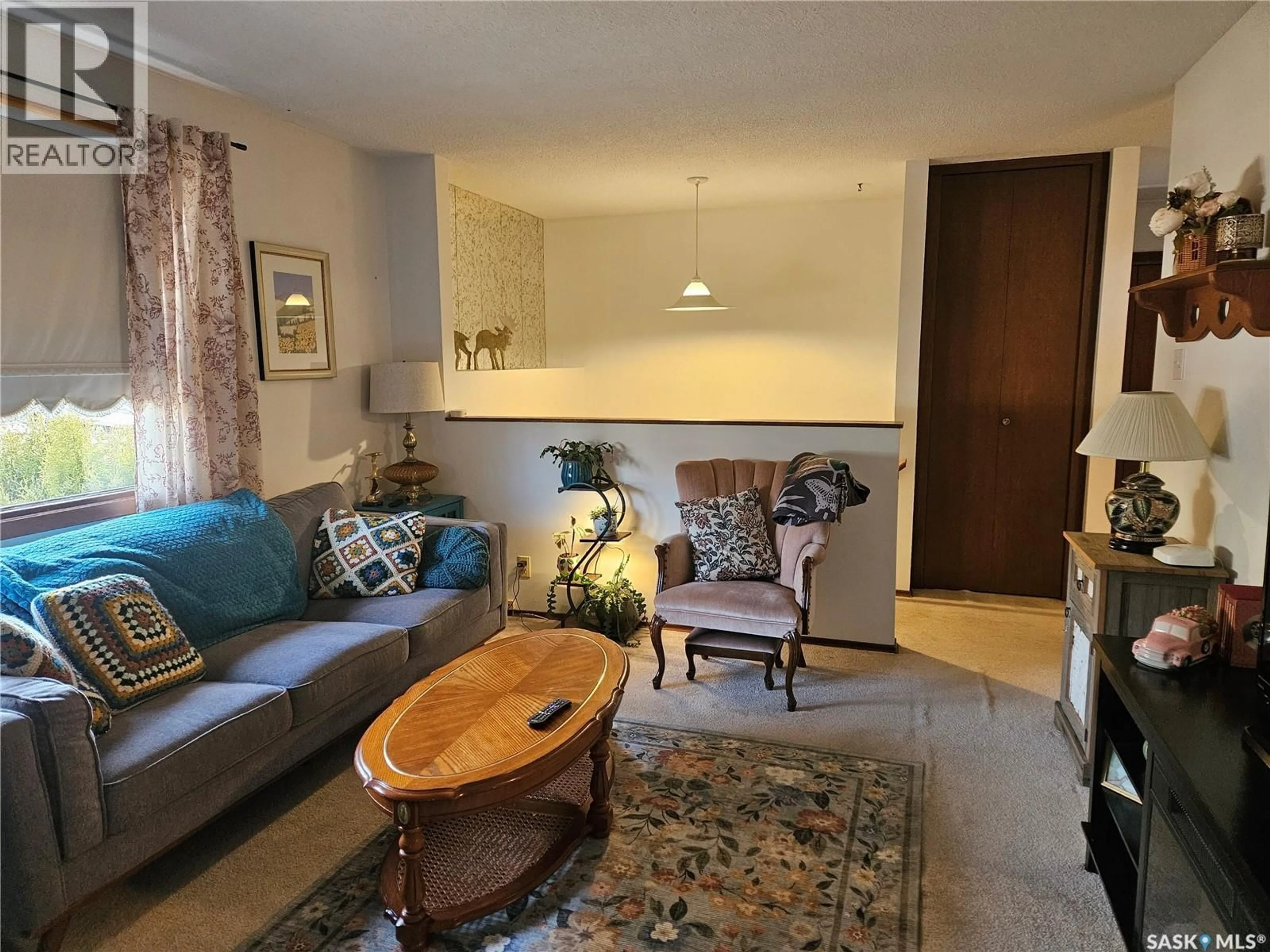 Living room with furniture, unknown for 335 ASPEN DRIVE, Swift Current Saskatchewan S9H3Z8