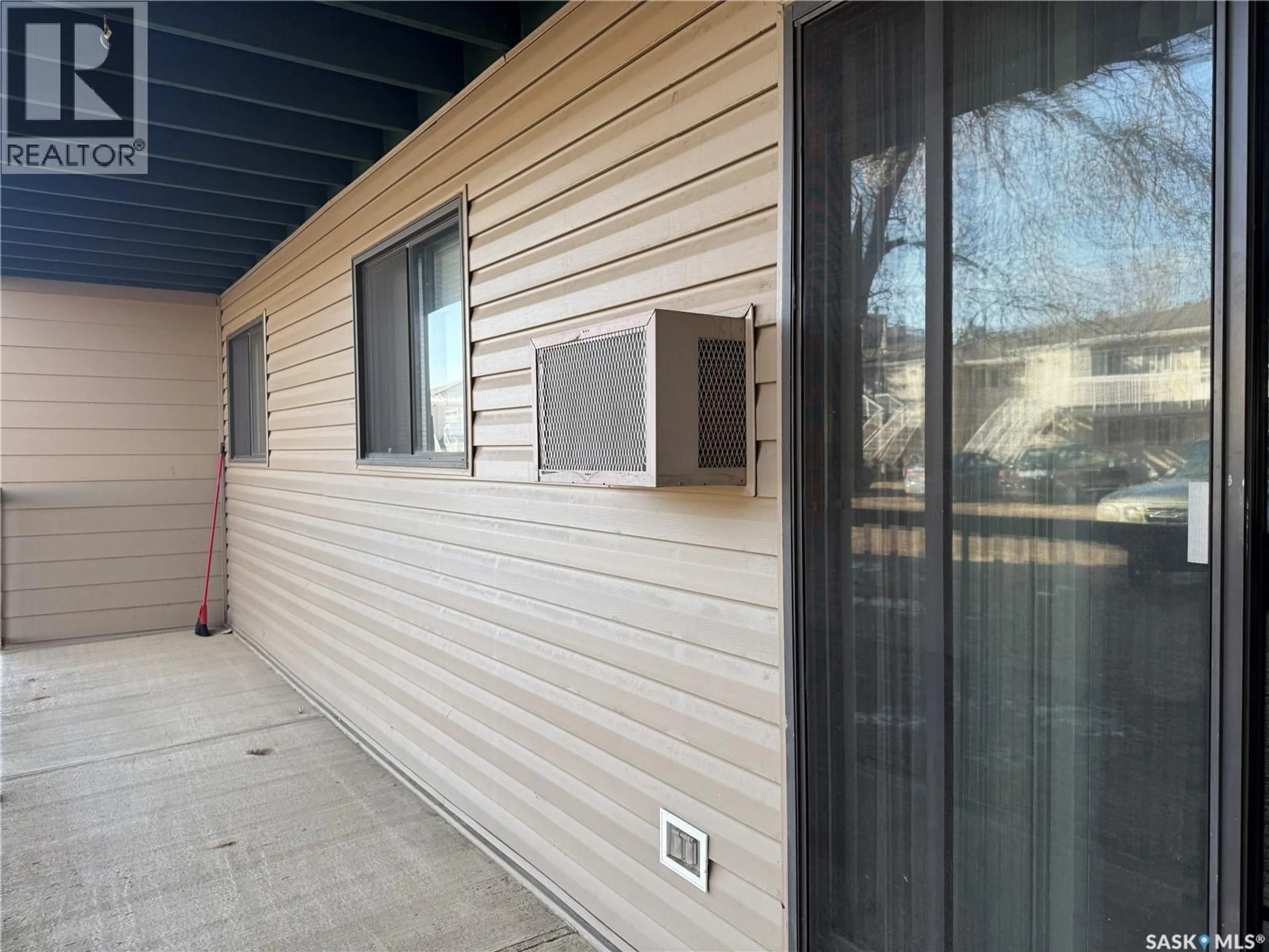 Home with vinyl exterior material, street for 101C WOOD LILY DRIVE, Moose Jaw Saskatchewan S6H1H1