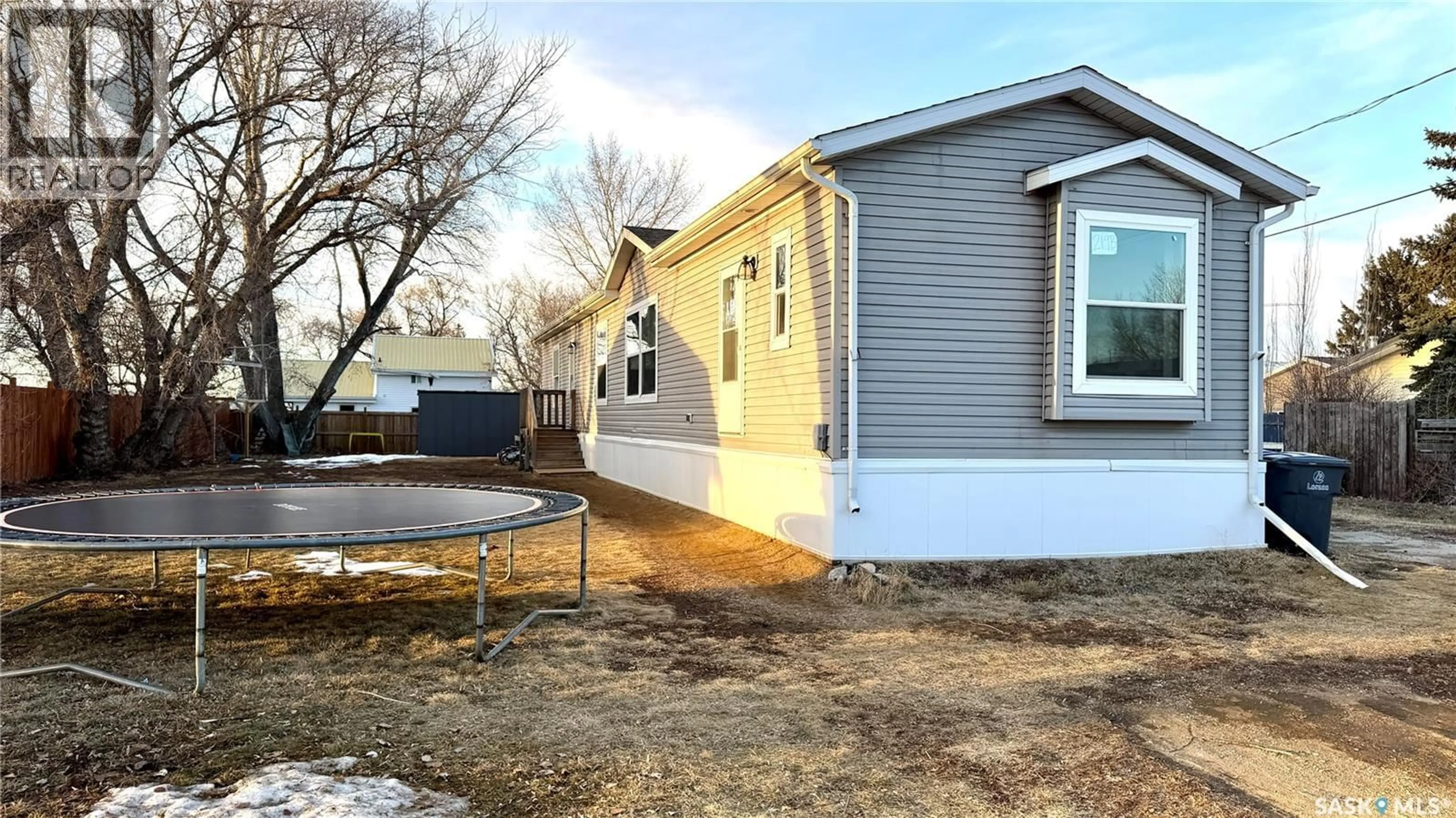 Home with vinyl exterior material, street for 219B KING STREET, Broderick Saskatchewan S0H0L0