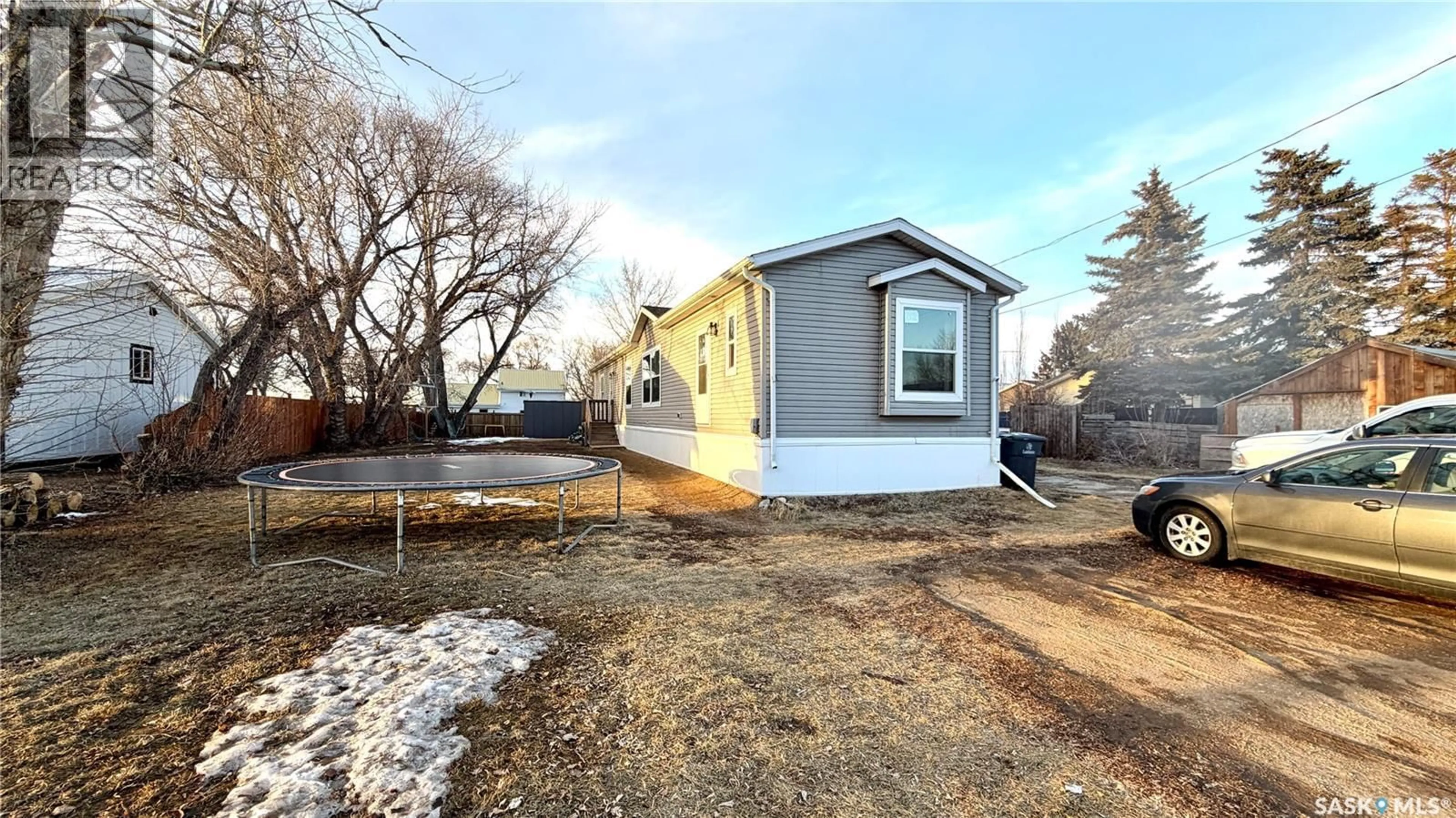 Home with vinyl exterior material, street for 219B KING STREET, Broderick Saskatchewan S0H0L0