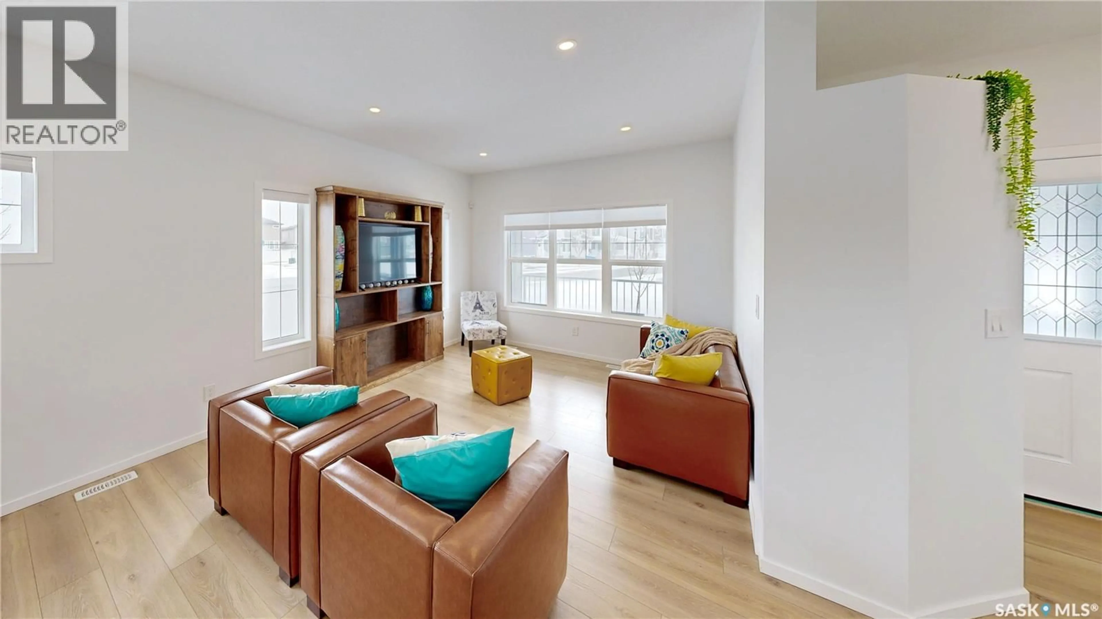 Living room with furniture, unknown for 3100 CROSBIE CRESCENT, Regina Saskatchewan S4V3S2