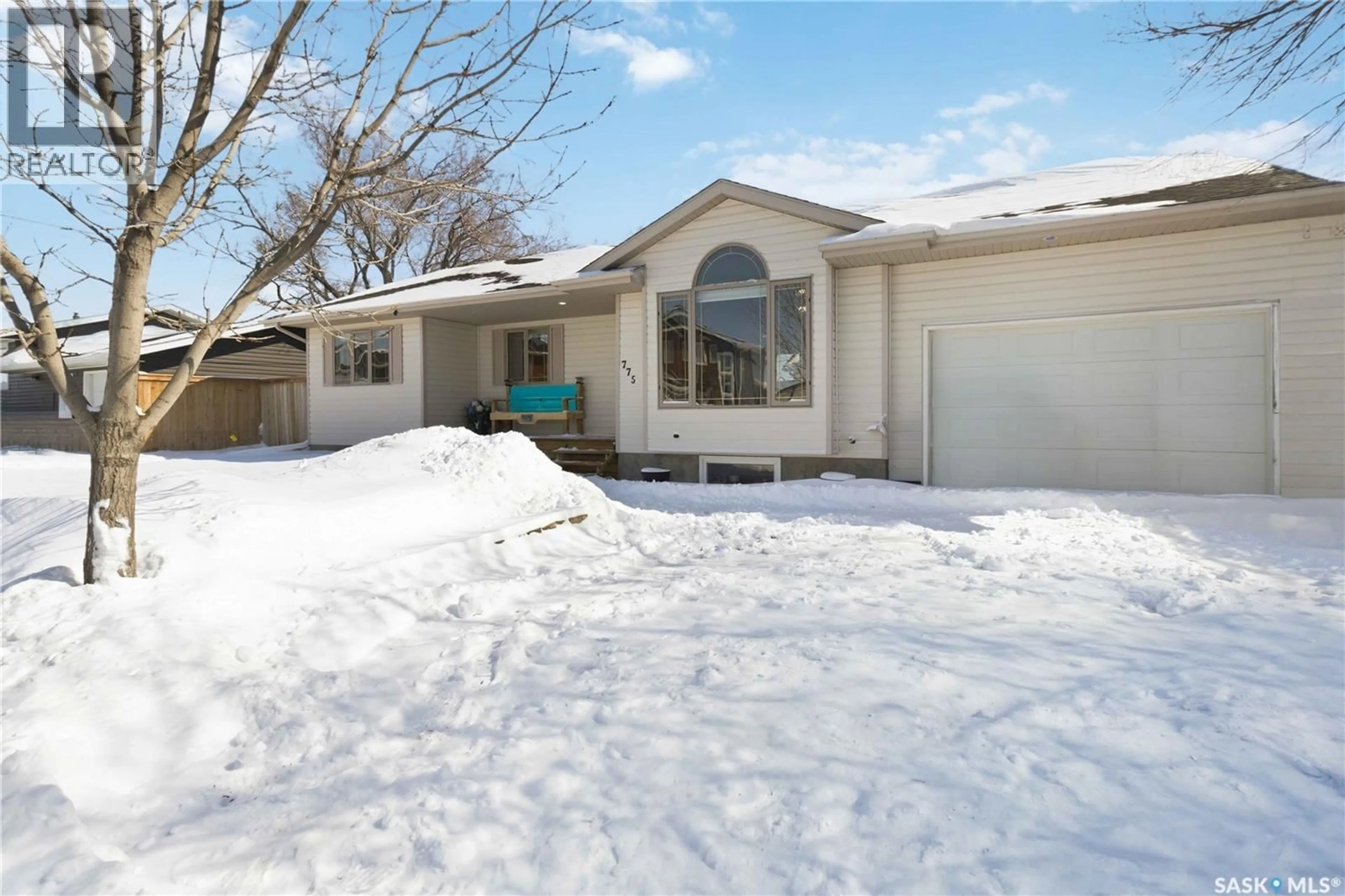 Home with vinyl exterior material, street for 775 1ST AVENUE, Martensville Saskatchewan S0K2T2