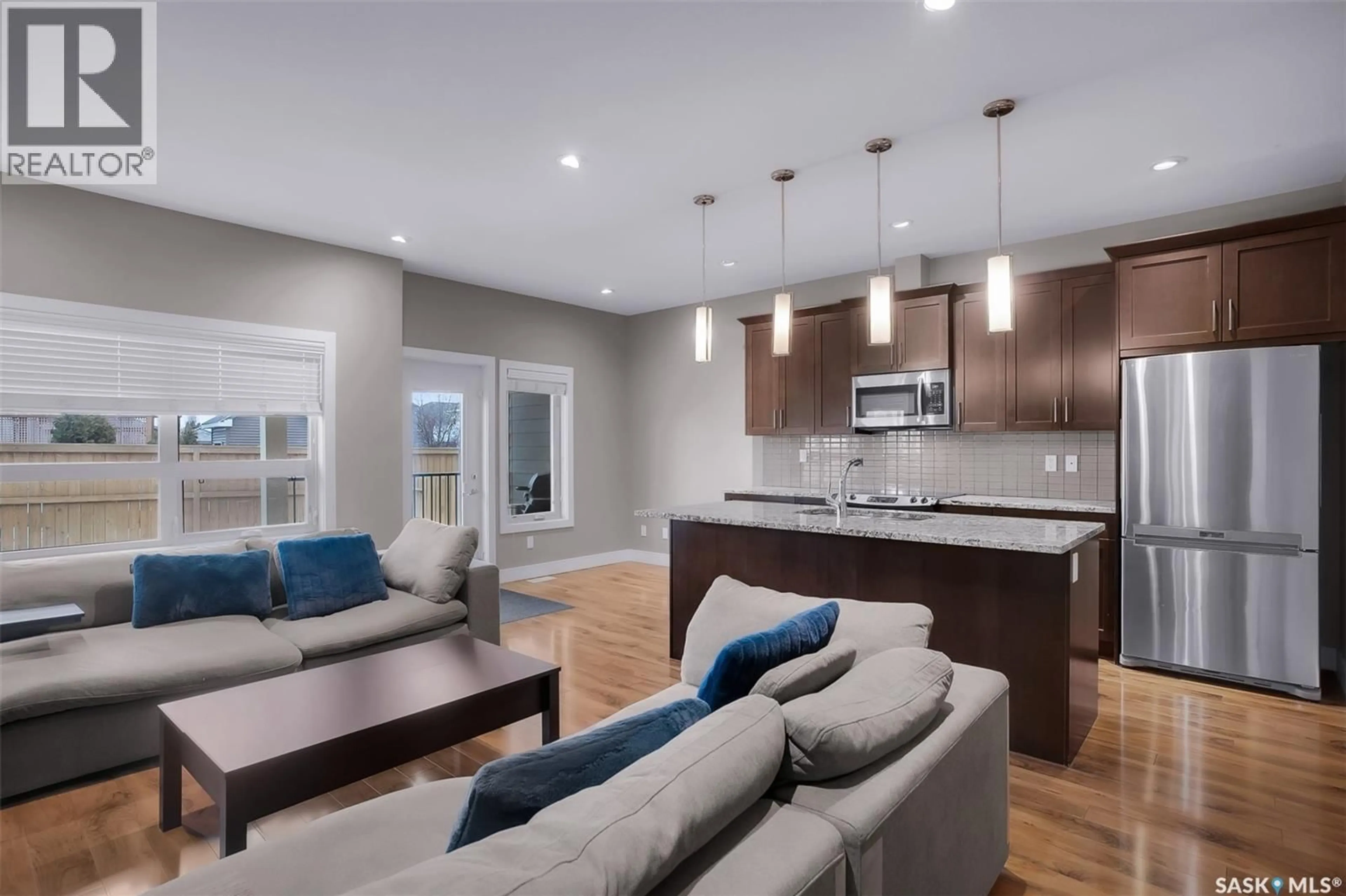 Open concept kitchen, unknown for 48 1550 PATON CRESCENT, Saskatoon Saskatchewan S7W0T8