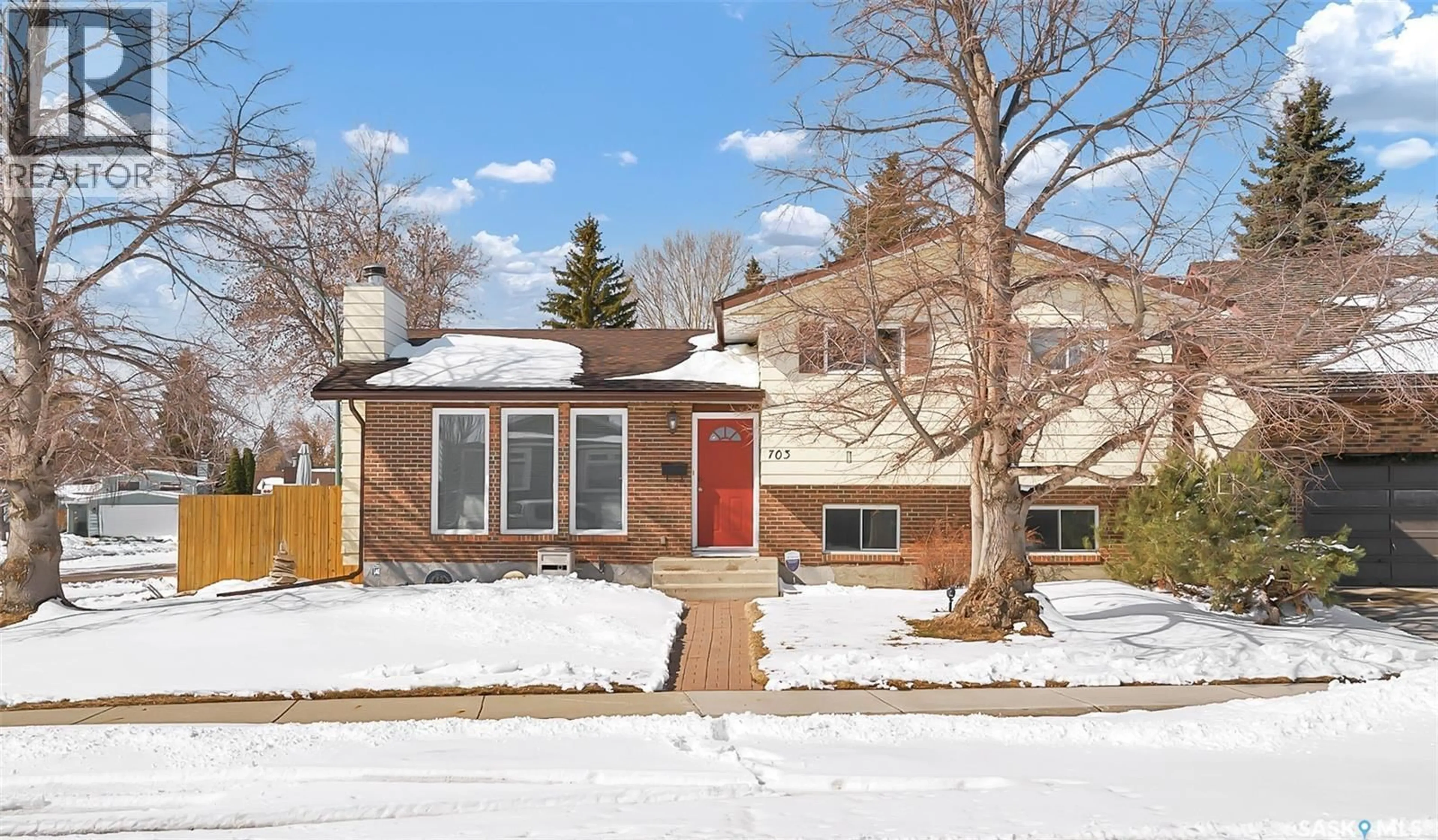 Home with brick exterior material, street for 703 CANDLE COURT, Saskatoon Saskatchewan S7K4Z9