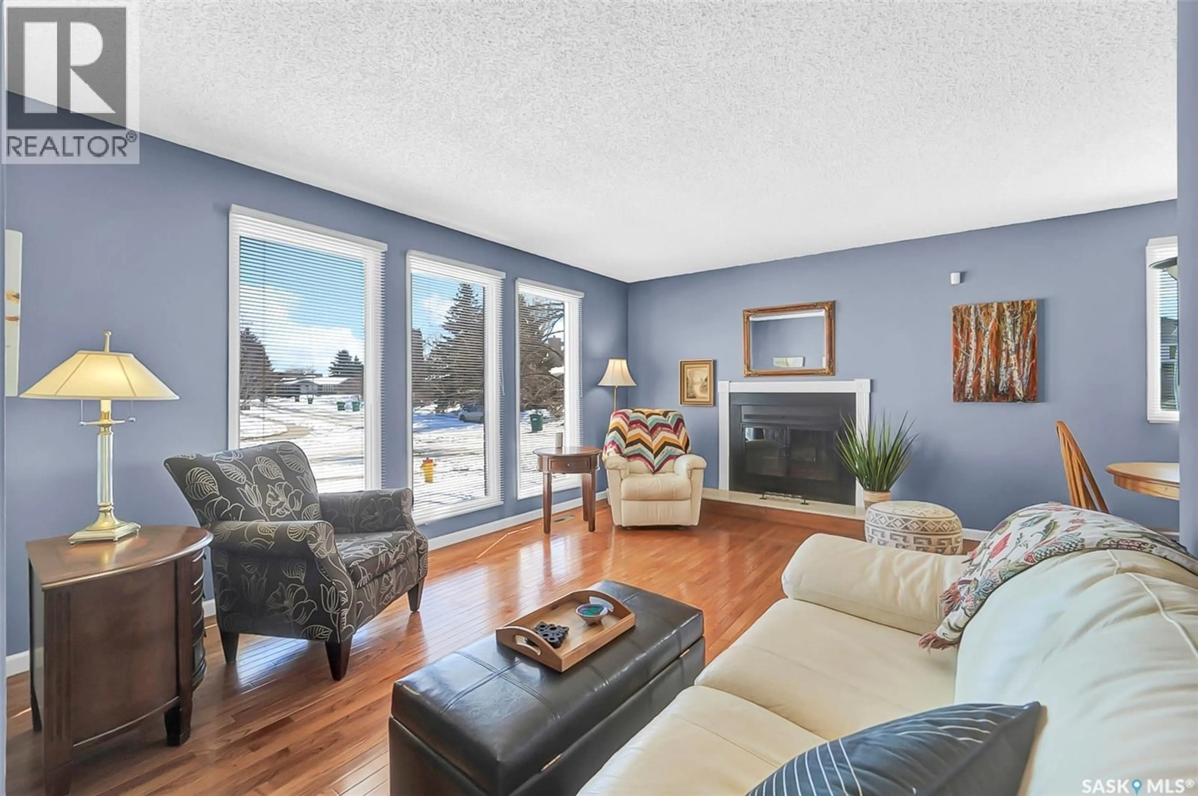 Living room with furniture, unknown for 703 CANDLE COURT, Saskatoon Saskatchewan S7K4Z9