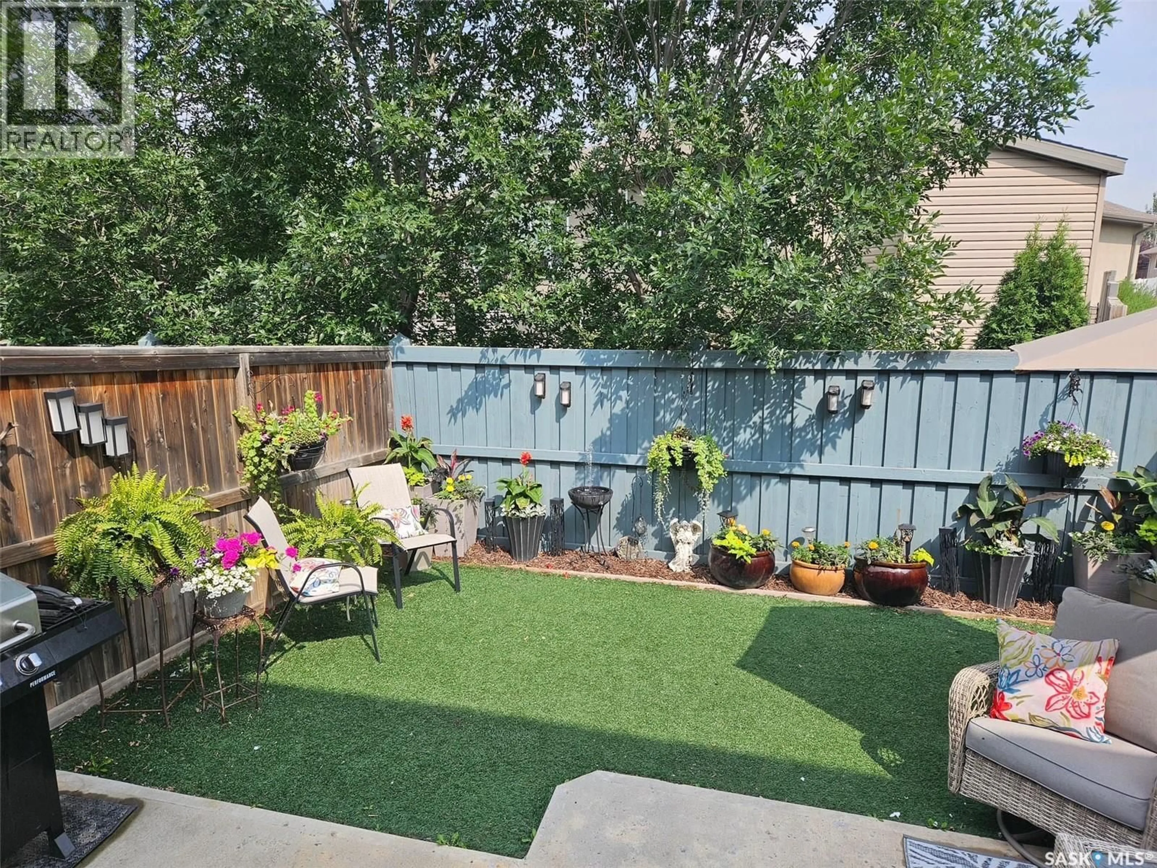 Patio, mountain view for 111 - 2501 WINDSOR PARK ROAD, Regina Saskatchewan S4V1P3