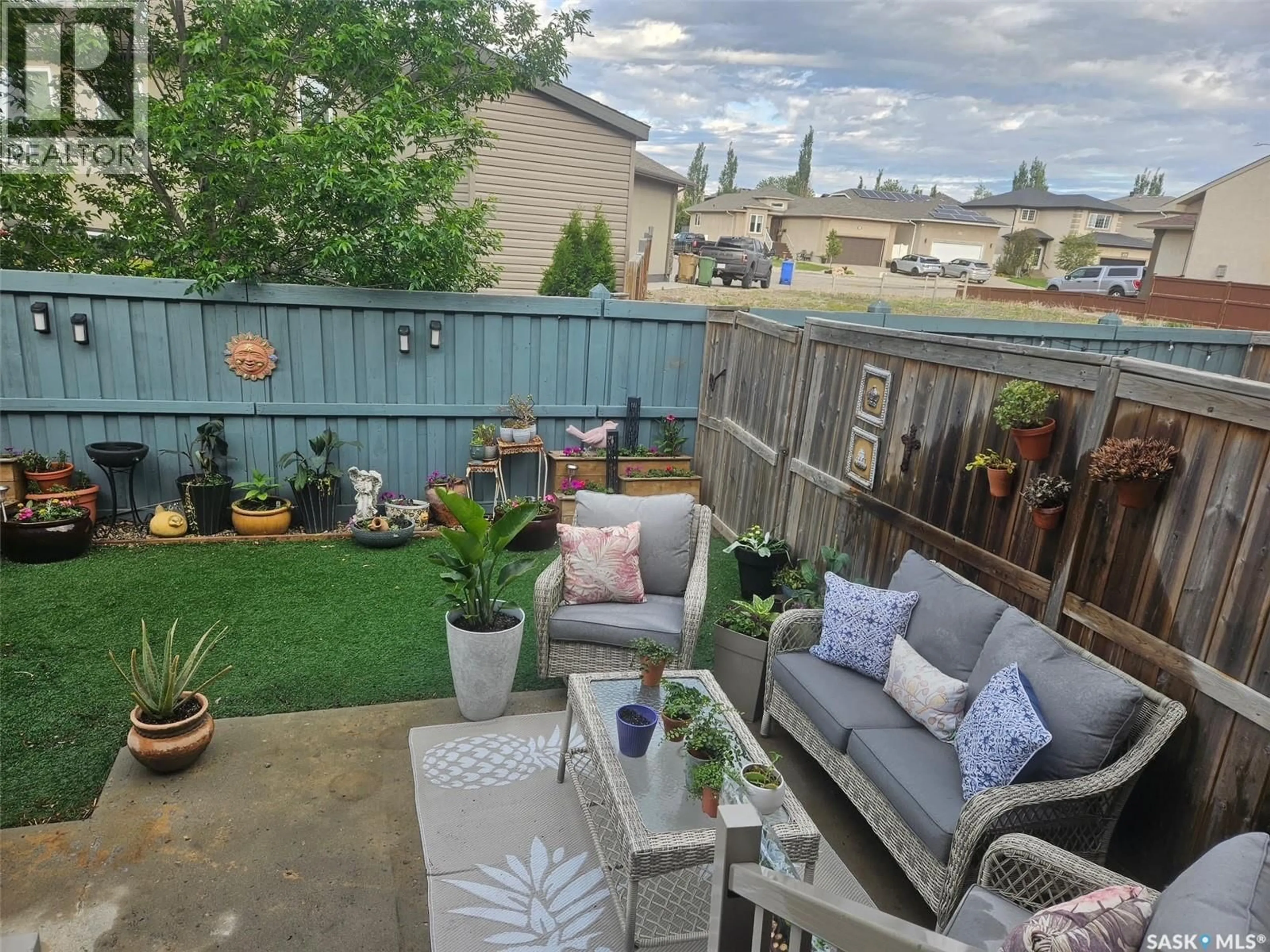 Patio, water/lake/river/ocean view for 111 - 2501 WINDSOR PARK ROAD, Regina Saskatchewan S4V1P3