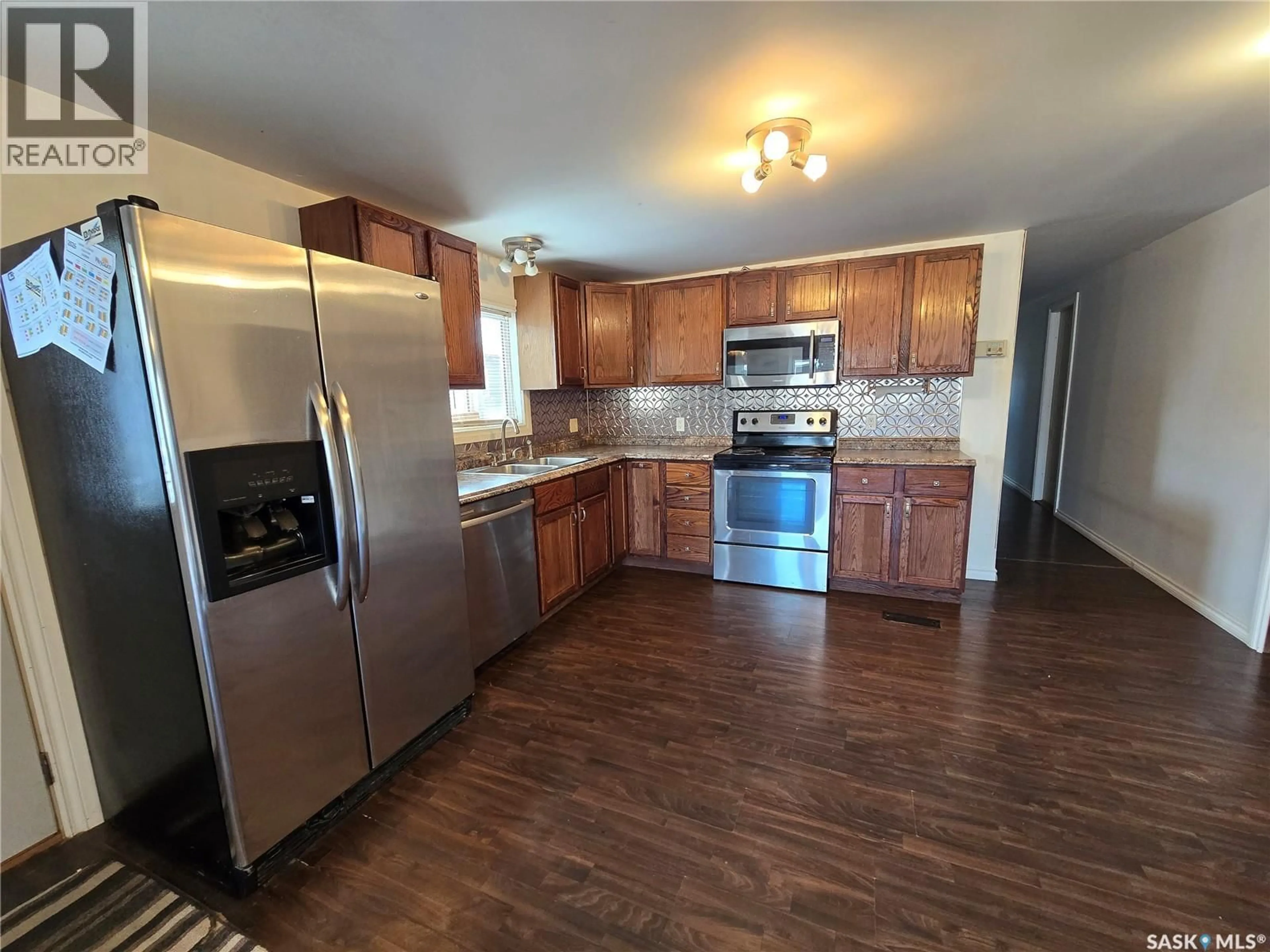 Open concept kitchen, unknown for 145 LAING CRESCENT, Weyburn Saskatchewan S4H2R8