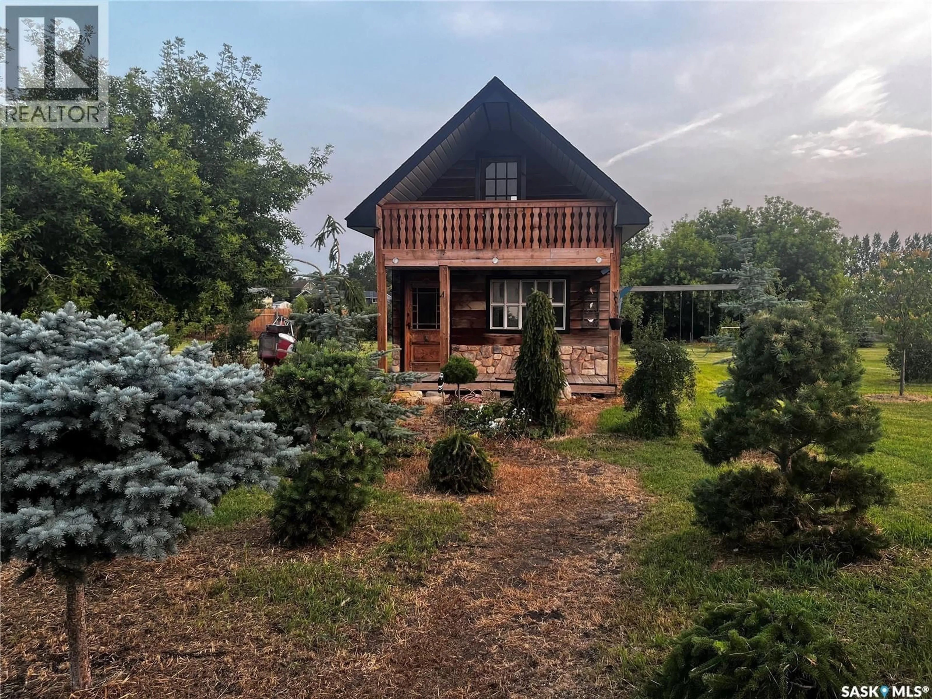 A pic from outside/outdoor area/front of a property/back of a property/a pic from drone, mountain view for 1306 ASSINIBOIA AVENUE, Grenfell Saskatchewan S0G2B0