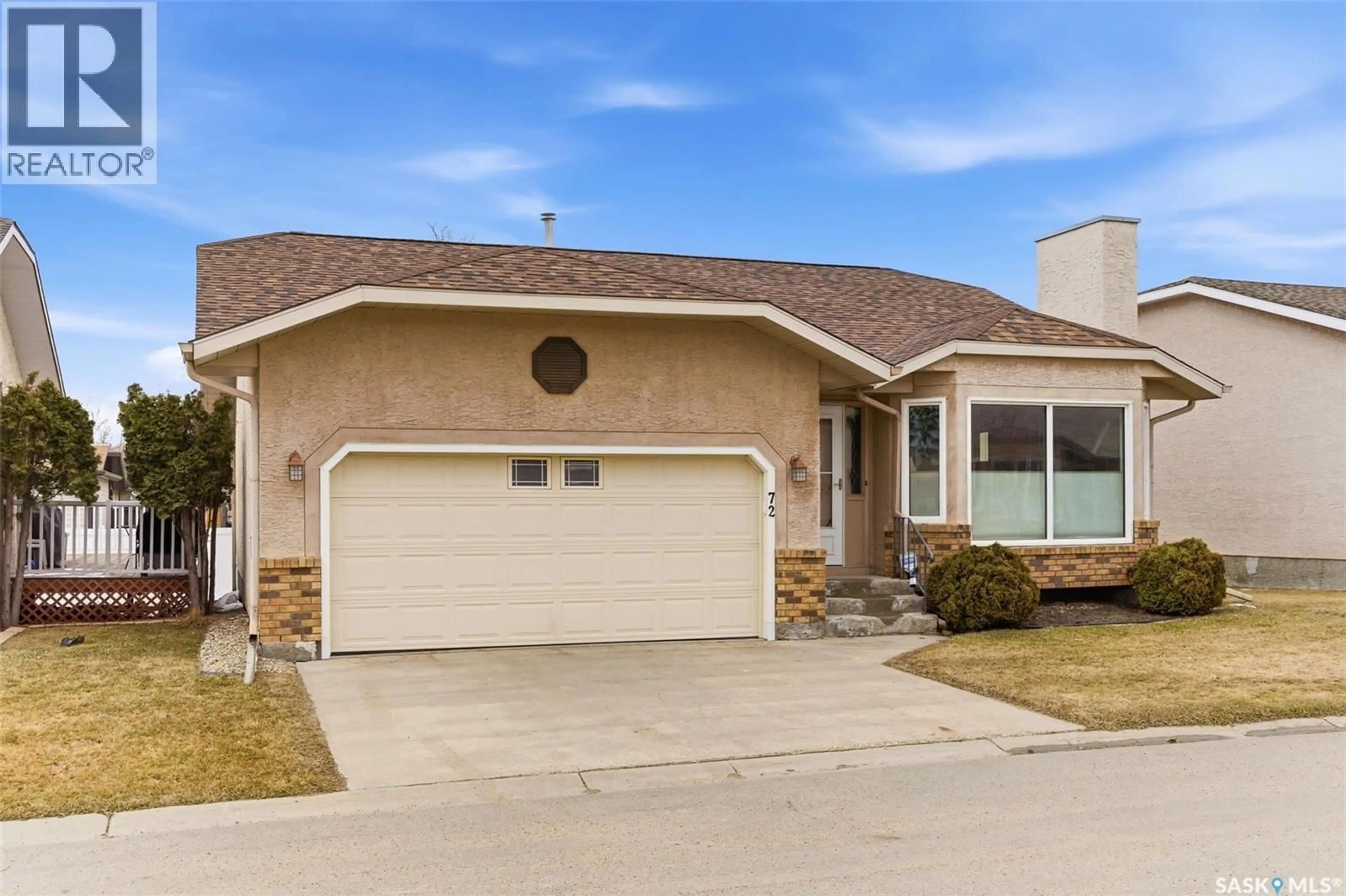 Home with vinyl exterior material, street for 72 GREENSBORO DRIVE, Regina Saskatchewan S4S7G1
