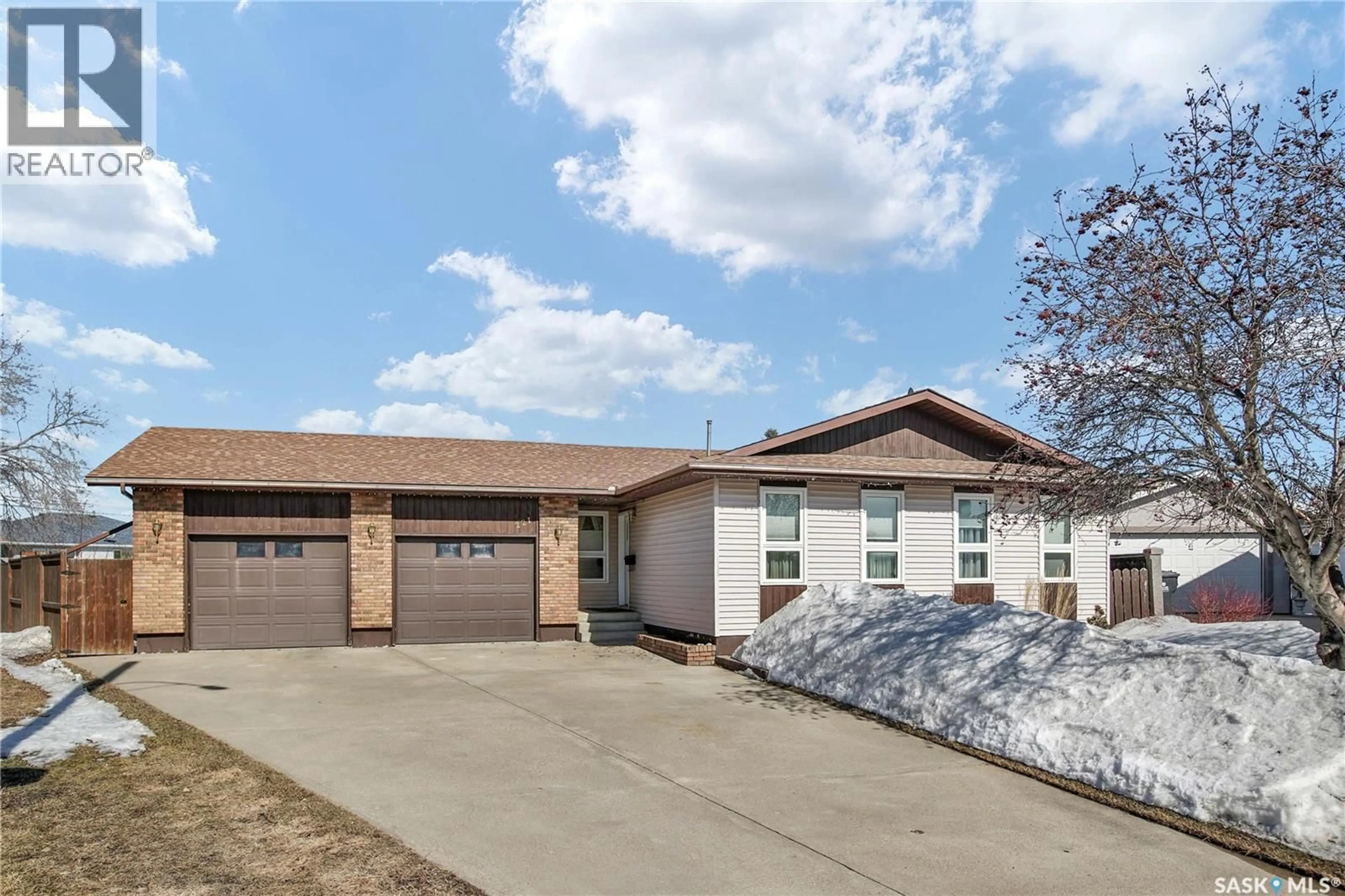 Home with brick exterior material, street for 221 LANE COURT, Warman Saskatchewan S0K4S0