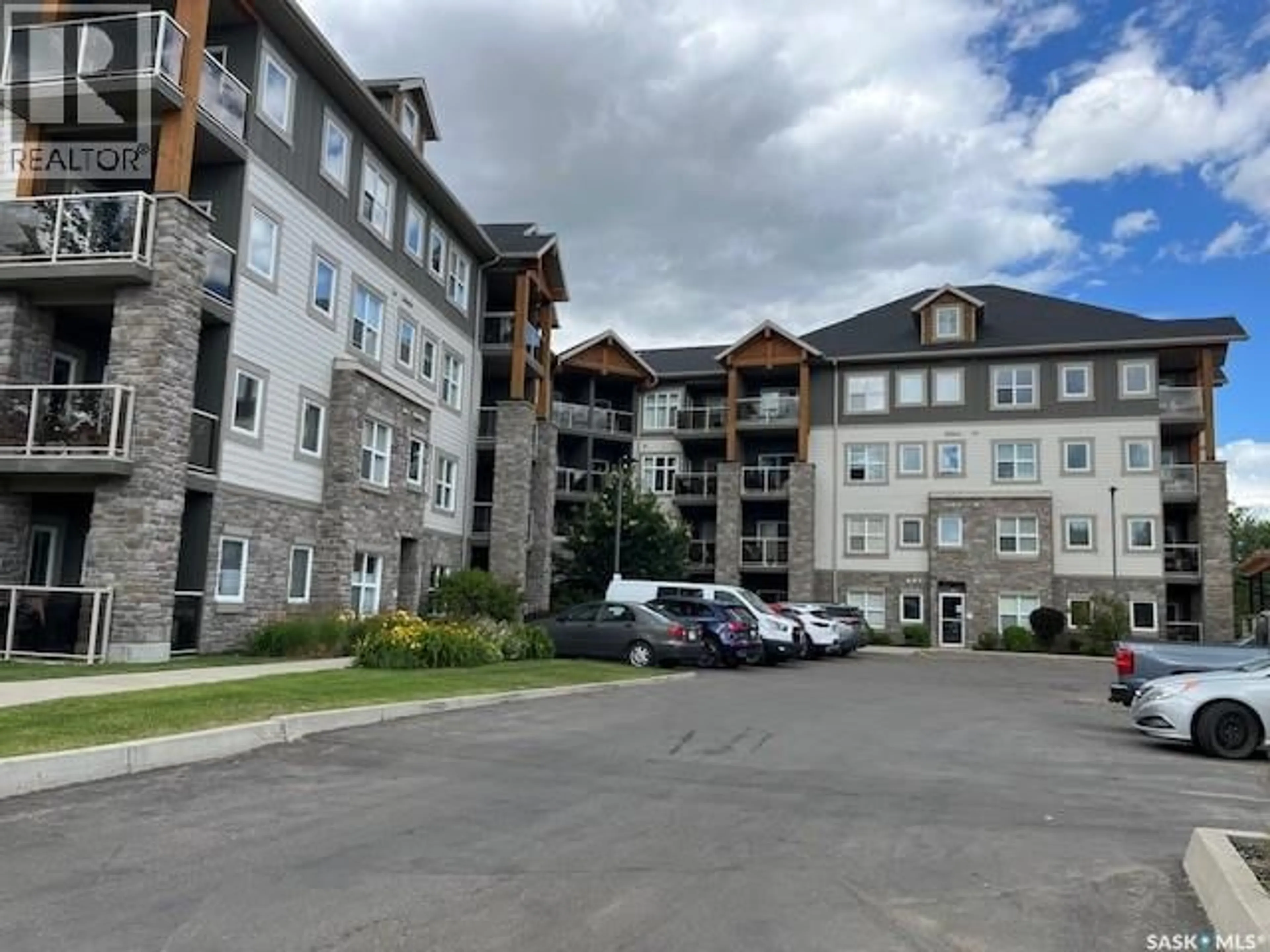 A pic from outside/outdoor area/front of a property/back of a property/a pic from drone, mountain view for 109 - 1220 BLACKFOOT DRIVE, Regina Saskatchewan S4S6T2