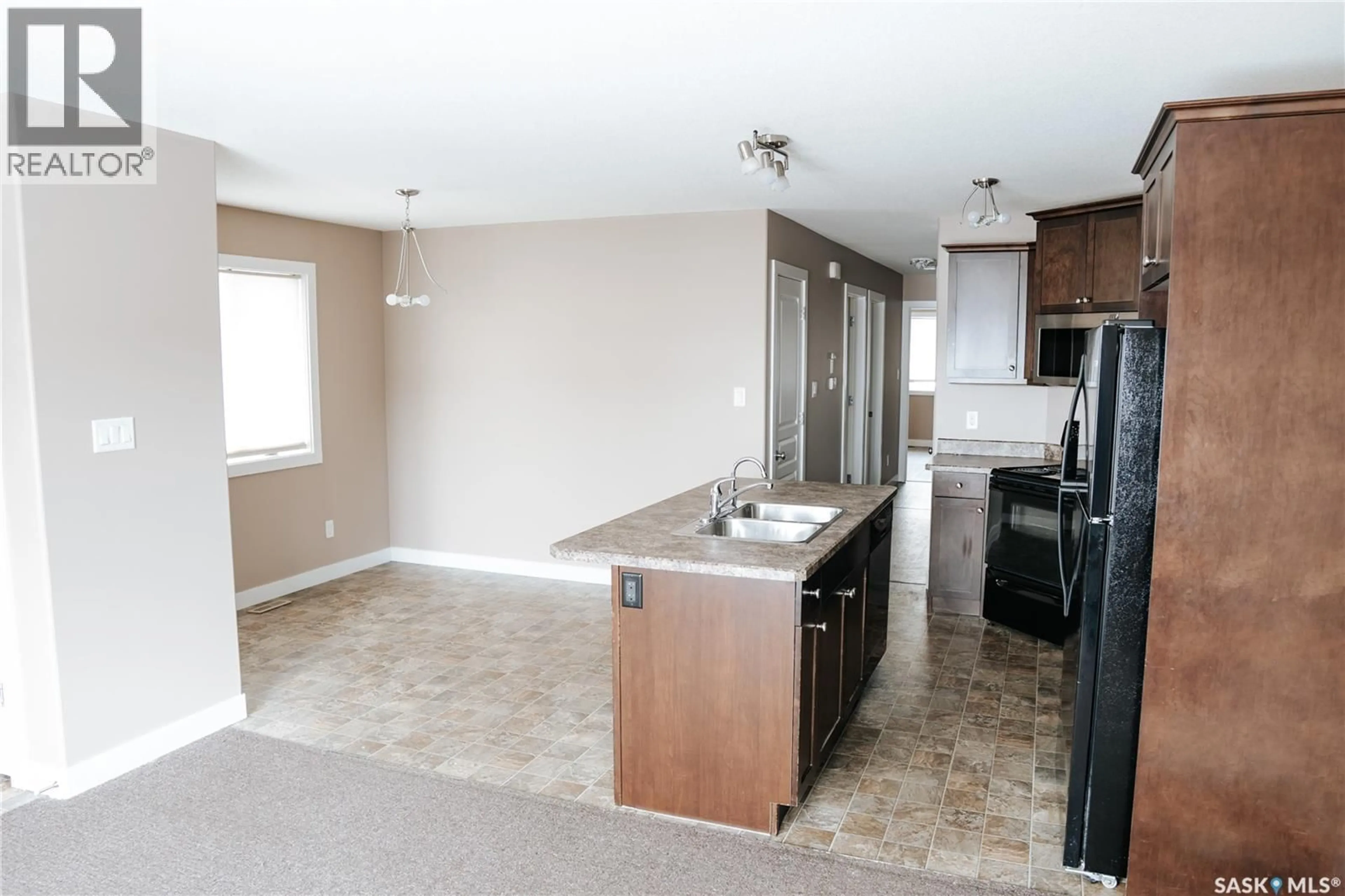 Open concept kitchen, unknown for 165 MCINTYRE STREET, Regina Saskatchewan S4R3B6