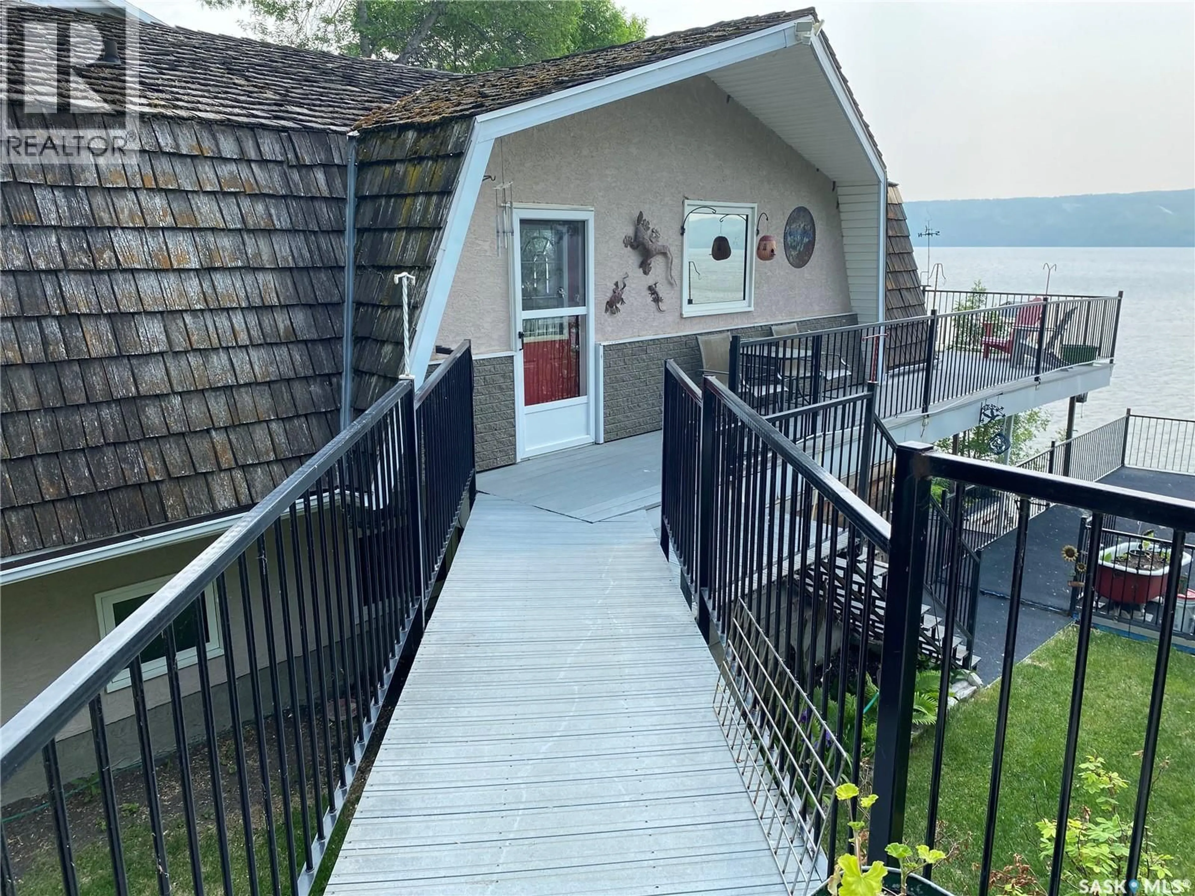 A pic from outside/outdoor area/front of a property/back of a property/a pic from drone, street for 186 PASQUA LAKE ROAD, North Qu'Appelle Rm No. 187 Saskatchewan S0G1S0