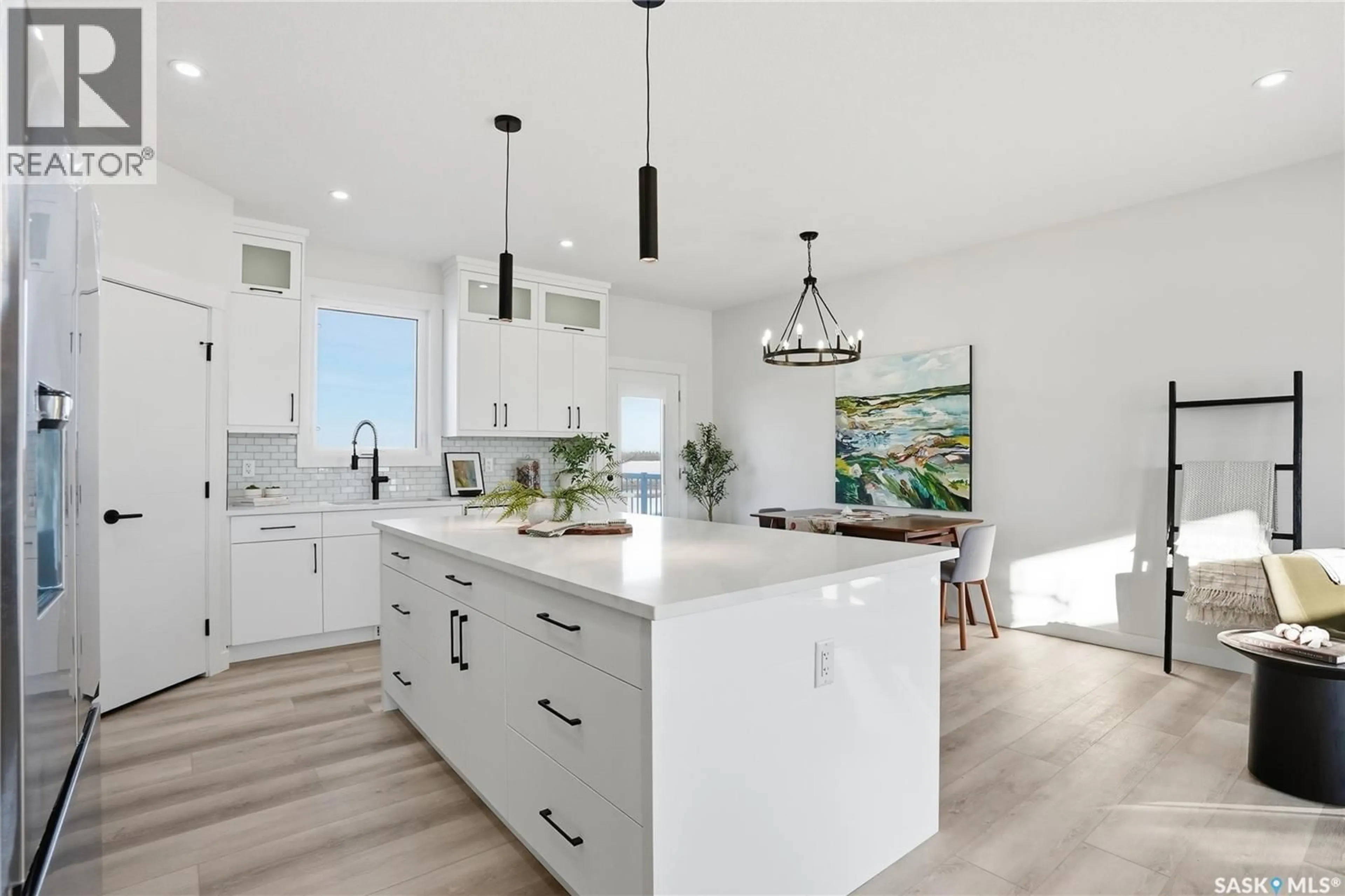 Open concept kitchen, unknown for 818 BALLESTEROS CRESCENT, Warman Saskatchewan S0K4S3