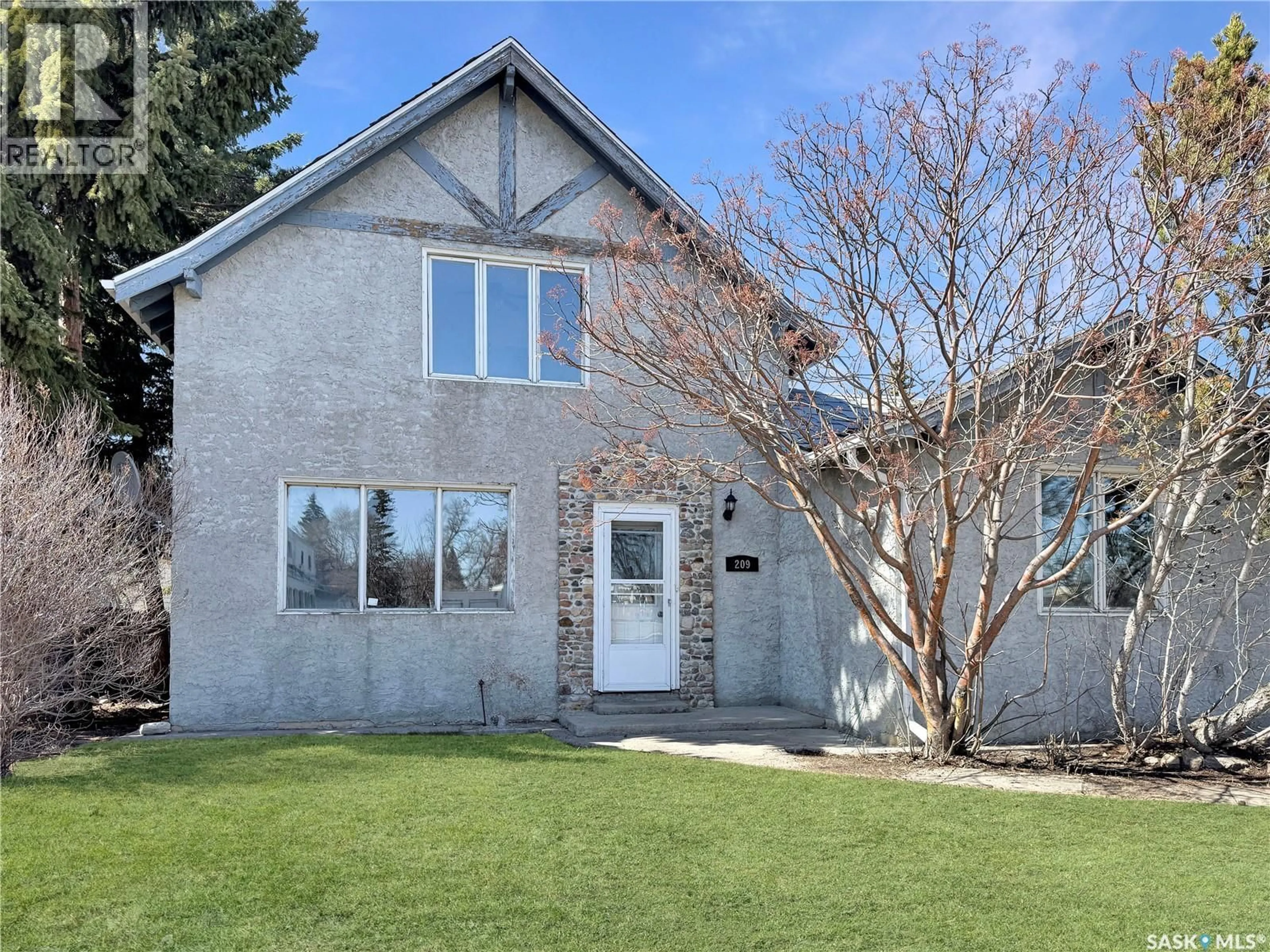 Home with brick exterior material, street for 209 MAIN STREET, Wilkie Saskatchewan S0K4W0