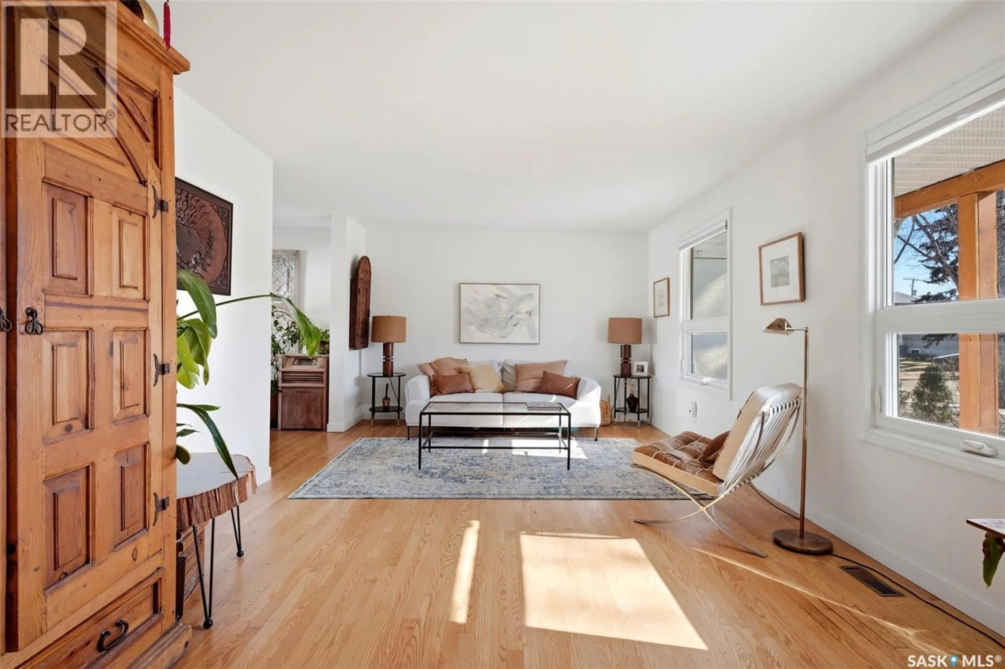 Living room with furniture, wood/laminate floor for 89 PATTERSON DRIVE, Regina Saskatchewan S4S3X1