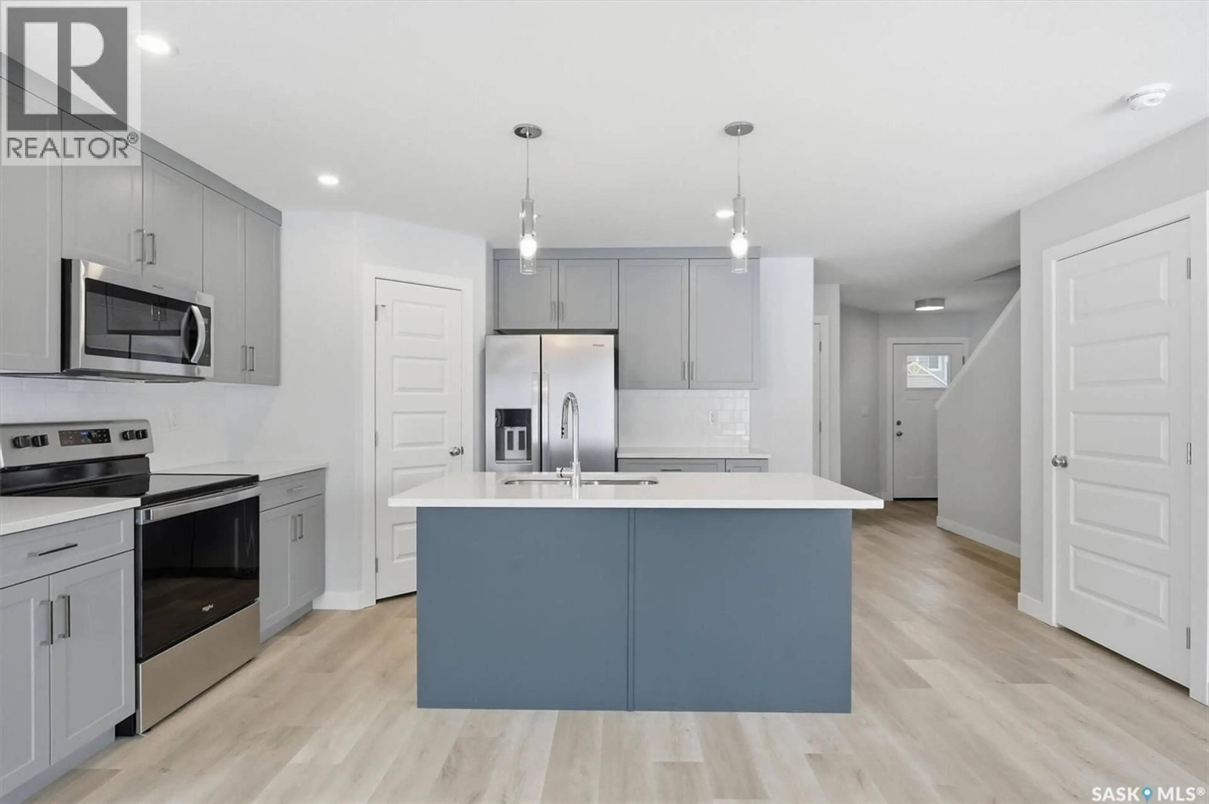 Open concept kitchen, unknown for 238 KOSTIUK CRESCENT, Saskatoon Saskatchewan S7V1R7