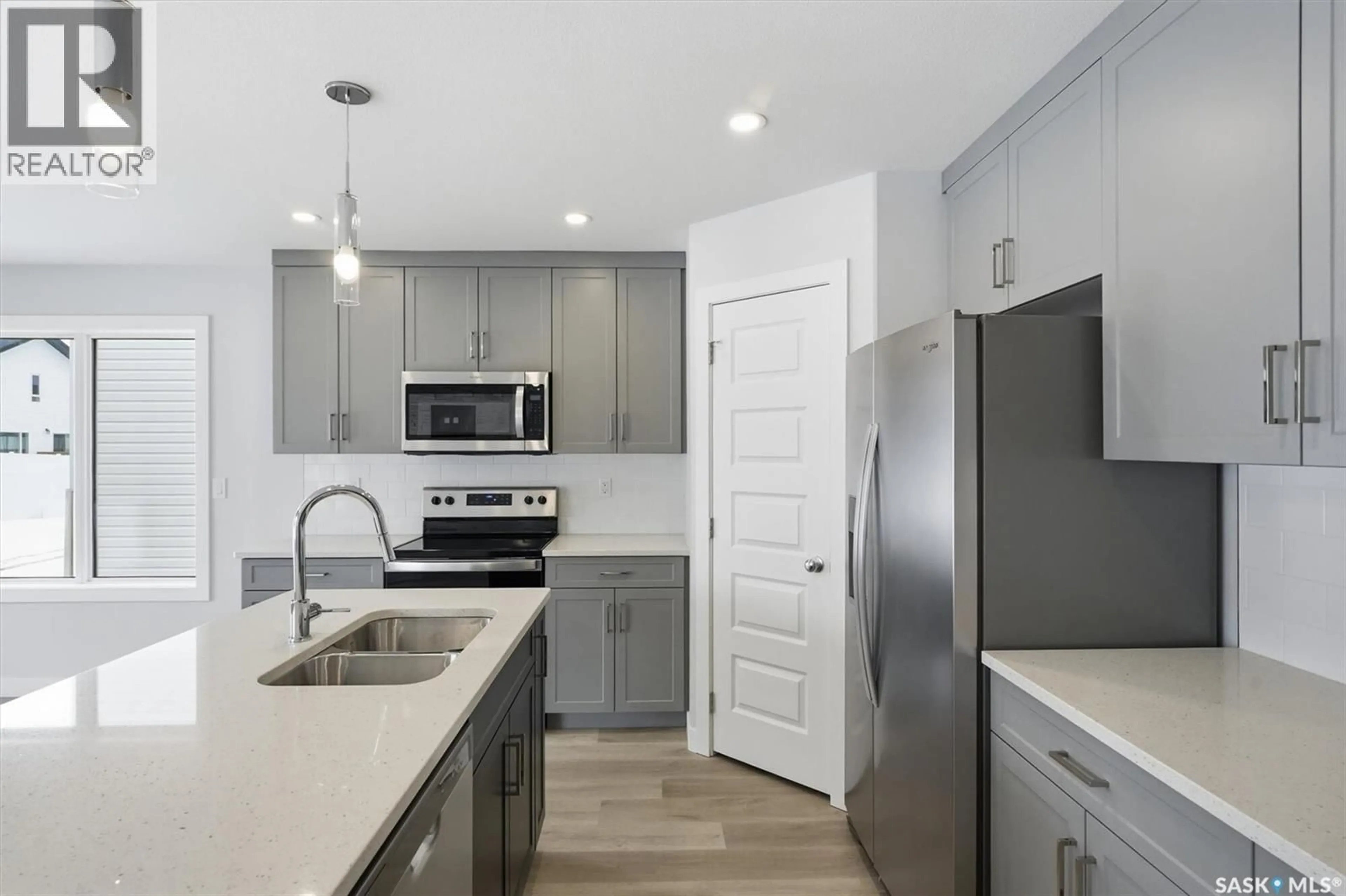 Open concept kitchen, unknown for 238 KOSTIUK CRESCENT, Saskatoon Saskatchewan S7V1R7