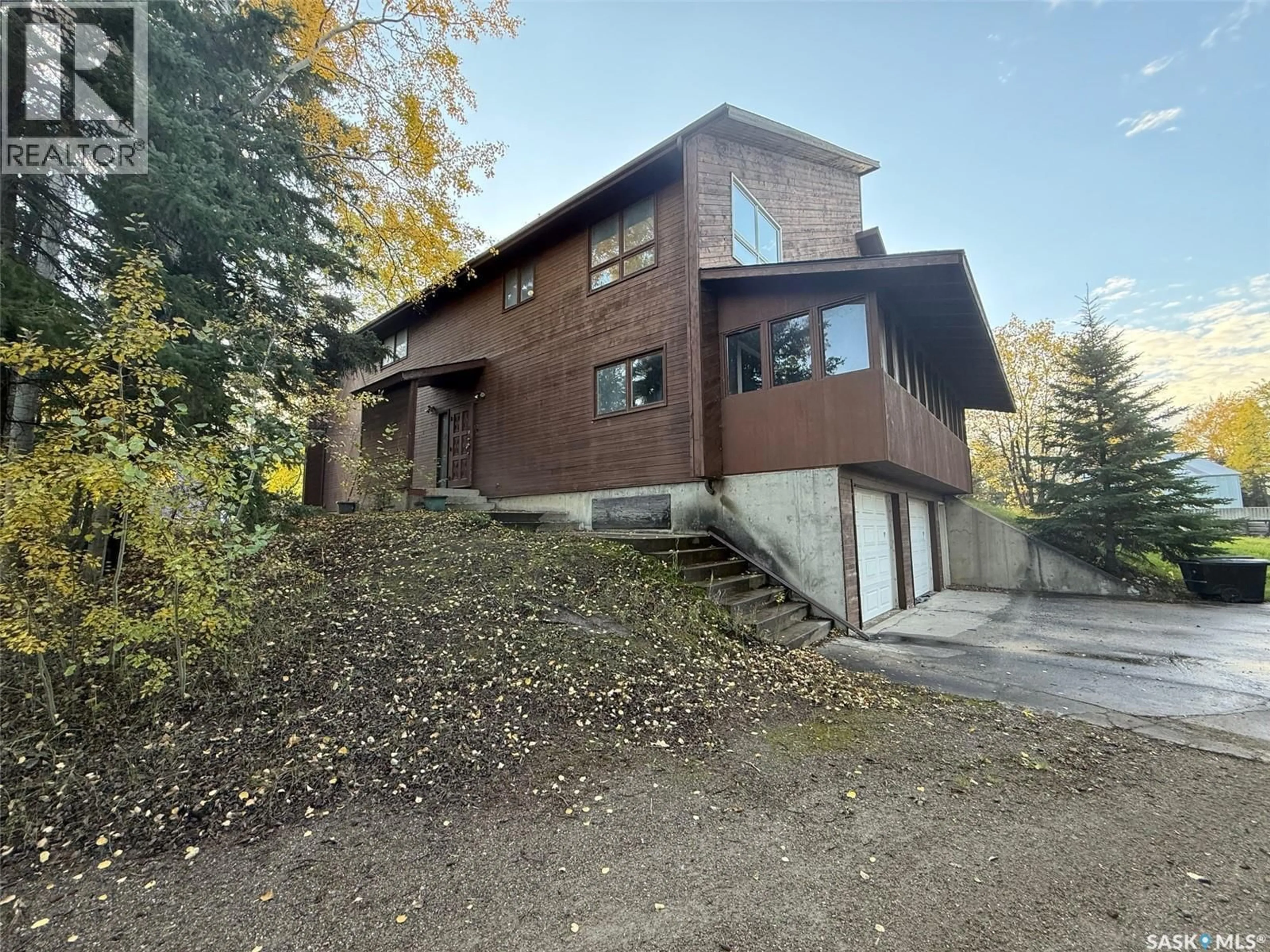 A pic from outside/outdoor area/front of a property/back of a property/a pic from drone, building for 130 ANSON STREET, Air Ronge Saskatchewan S0J3G0