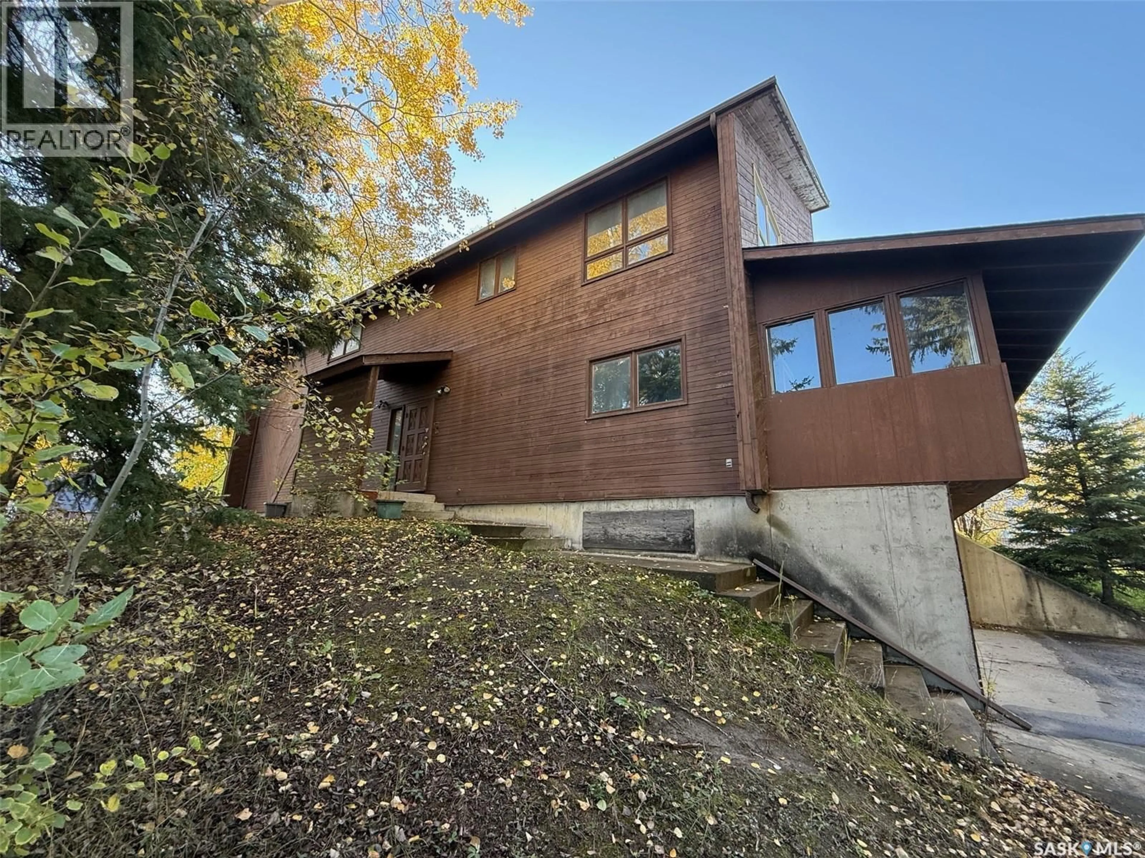 A pic from outside/outdoor area/front of a property/back of a property/a pic from drone, building for 130 ANSON STREET, Air Ronge Saskatchewan S0J3G0