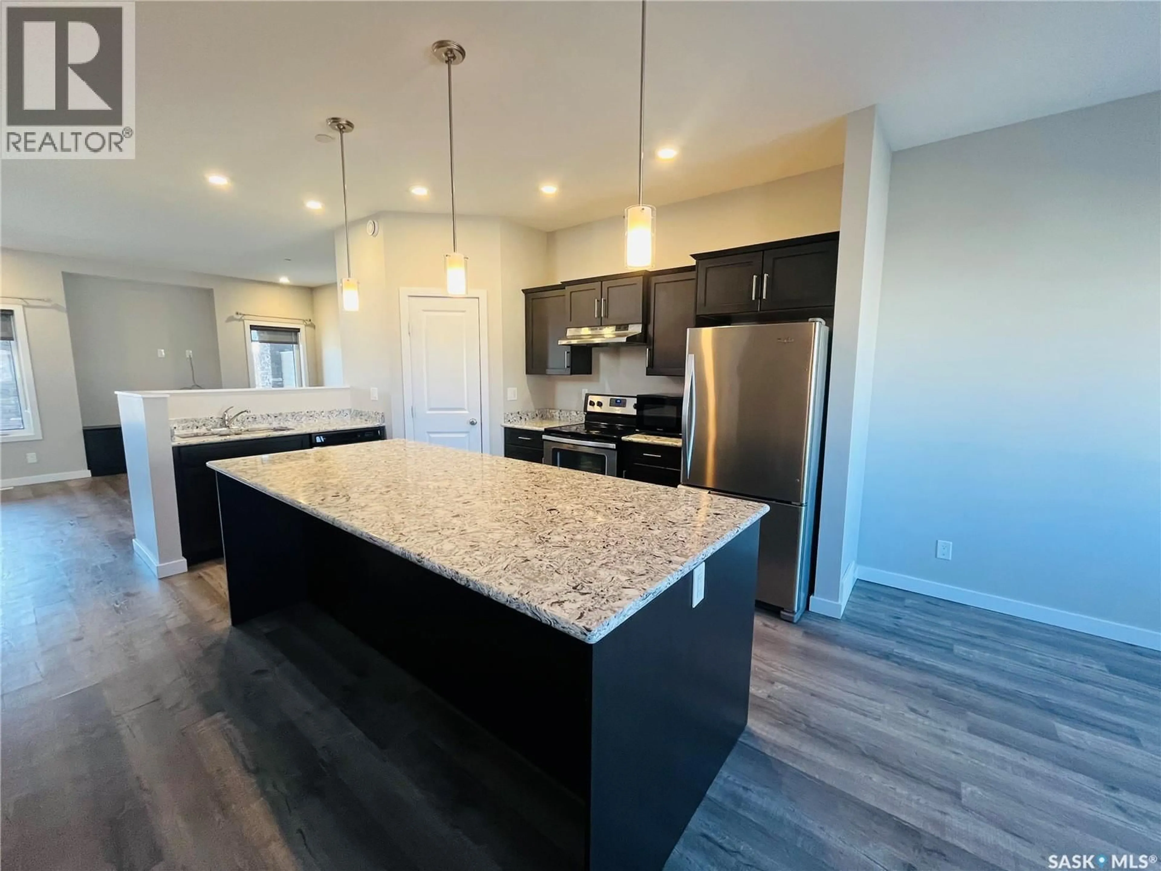 Open concept kitchen, unknown for 503 DOUGLAS DRIVE, Swift Current Saskatchewan S9H5R6
