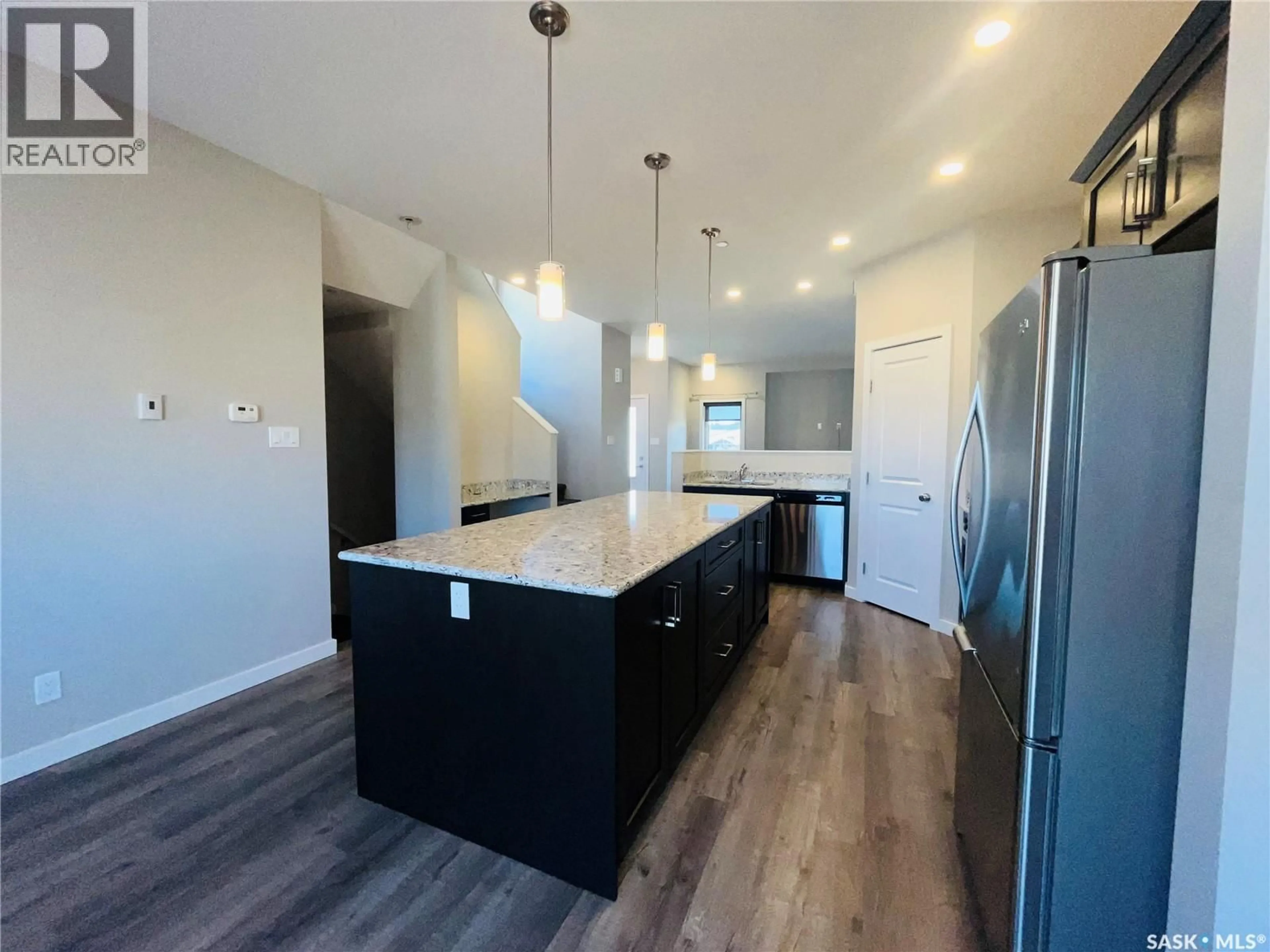 Open concept kitchen, unknown for 503 DOUGLAS DRIVE, Swift Current Saskatchewan S9H5R6