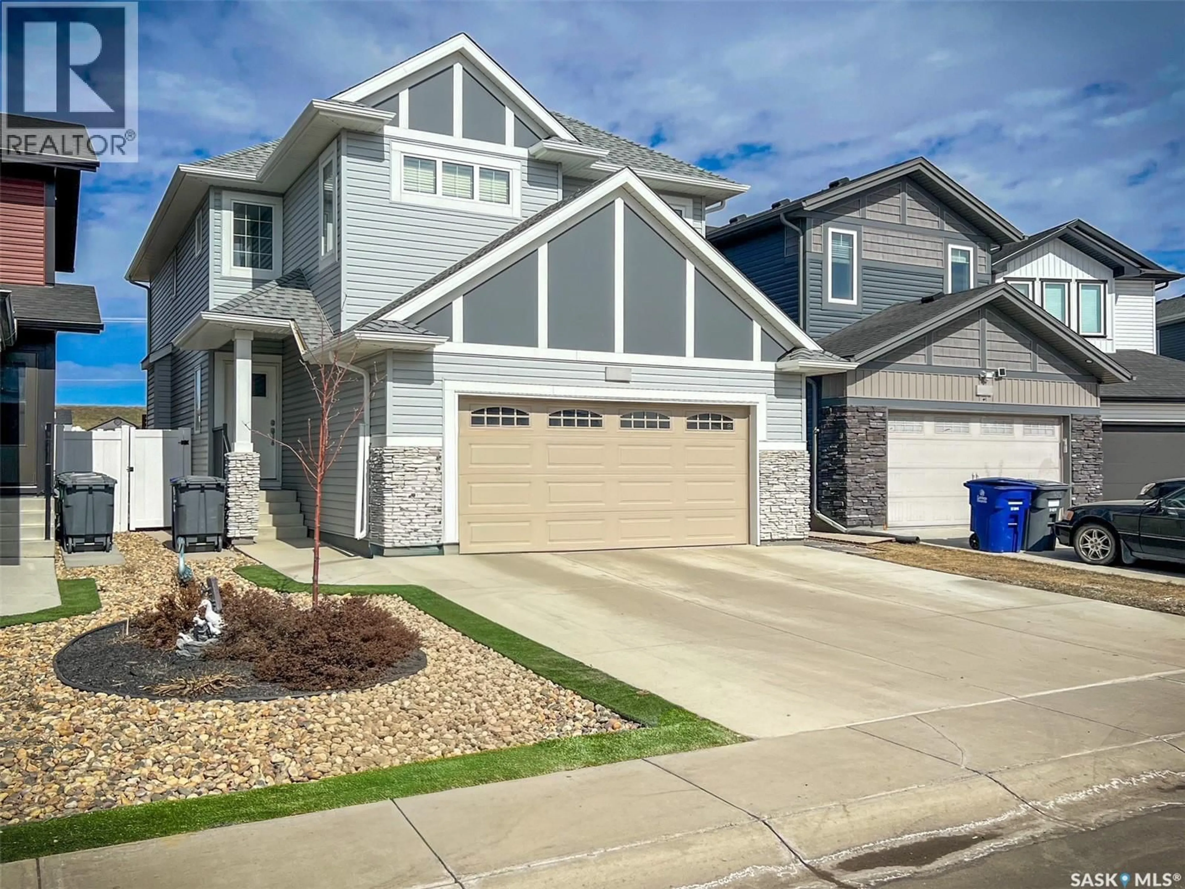 Home with vinyl exterior material, street for 429 GERMAIN MANOR, Saskatoon Saskatchewan S7V0V1