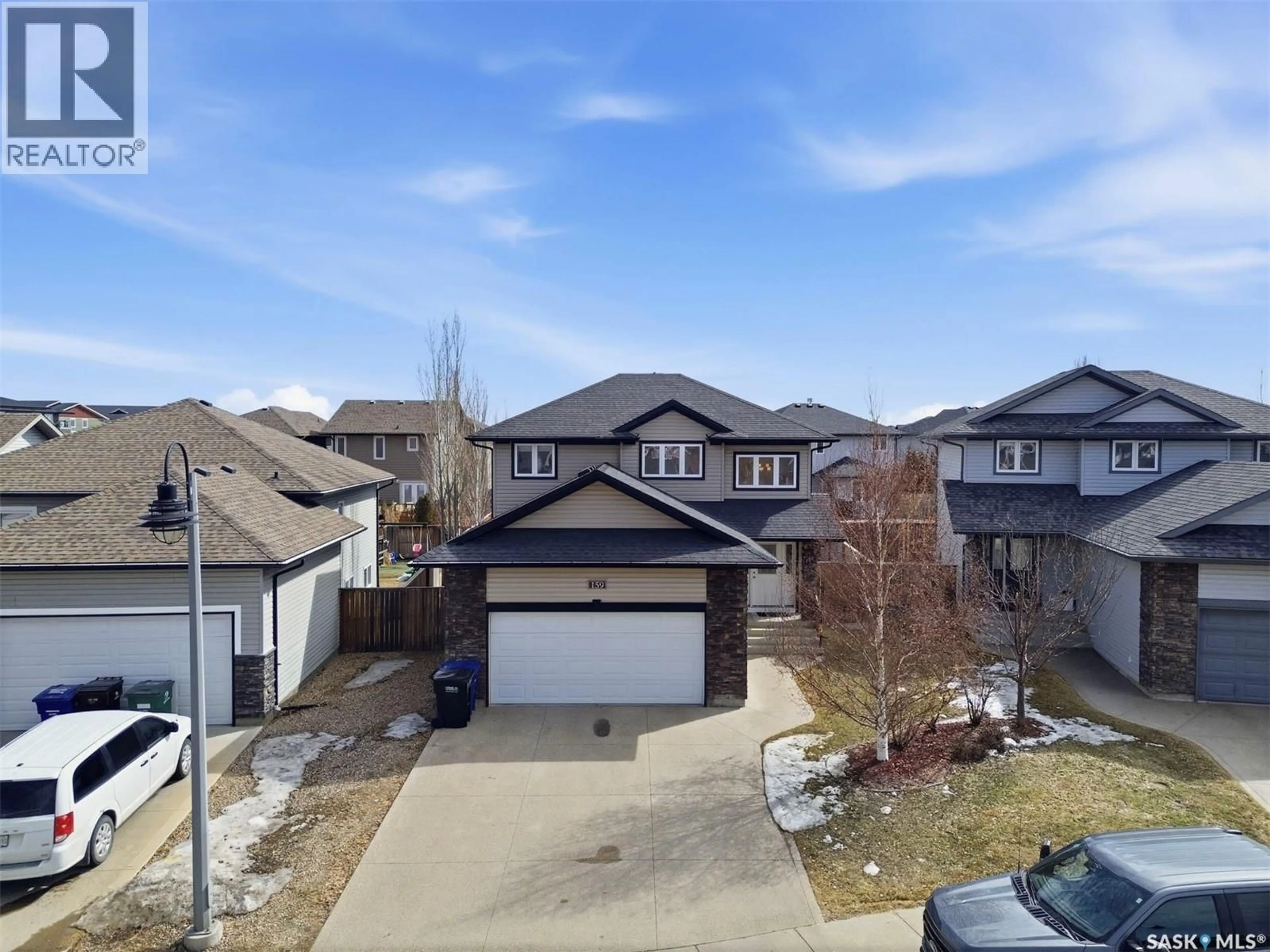 A pic from outside/outdoor area/front of a property/back of a property/a pic from drone, street for 159 DULMAGE CRESCENT, Saskatoon Saskatchewan S7T0K4