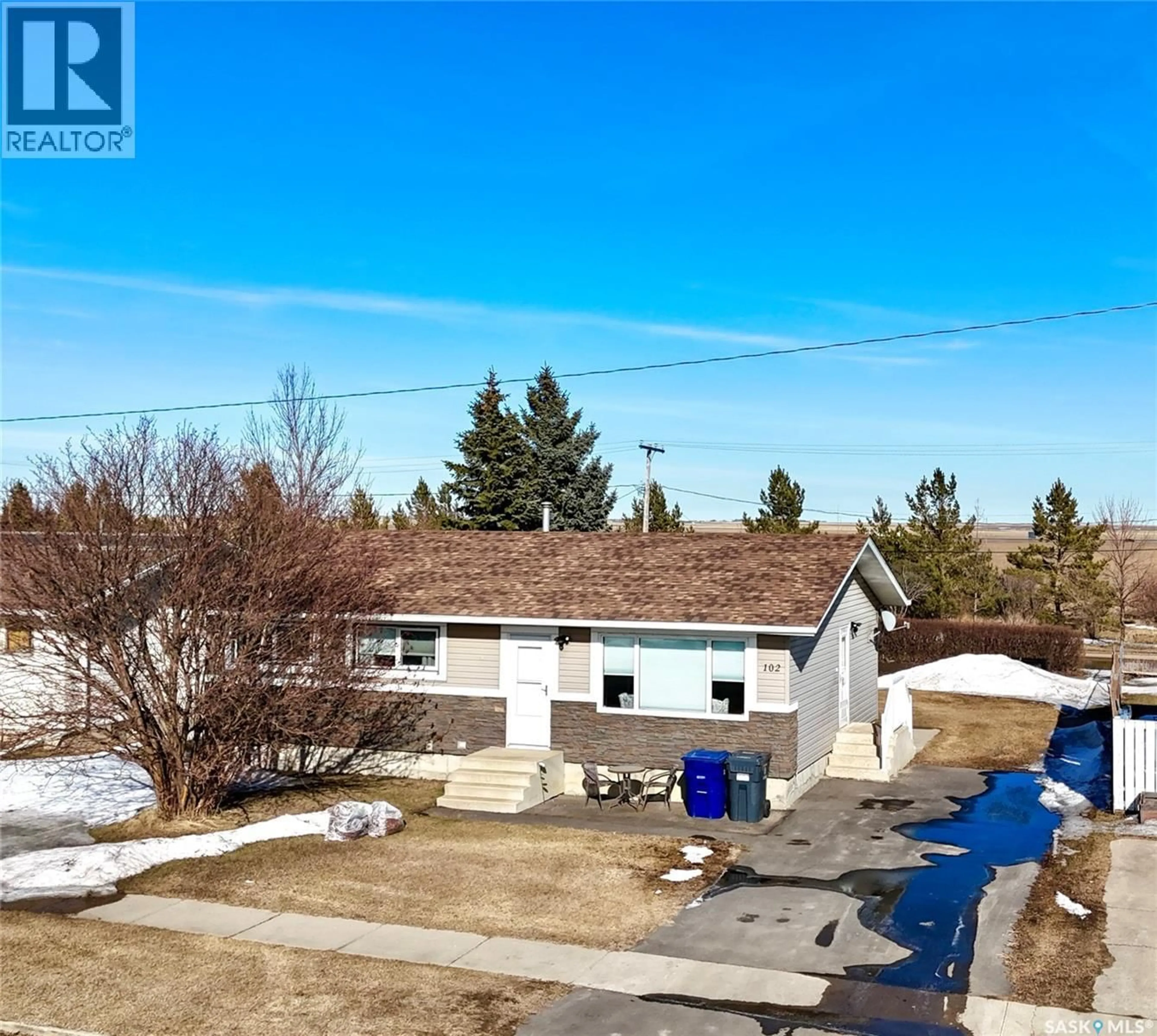 A pic from outside/outdoor area/front of a property/back of a property/a pic from drone, street for 102 GOVERNMENT ROAD, Davidson Saskatchewan S0G1A0