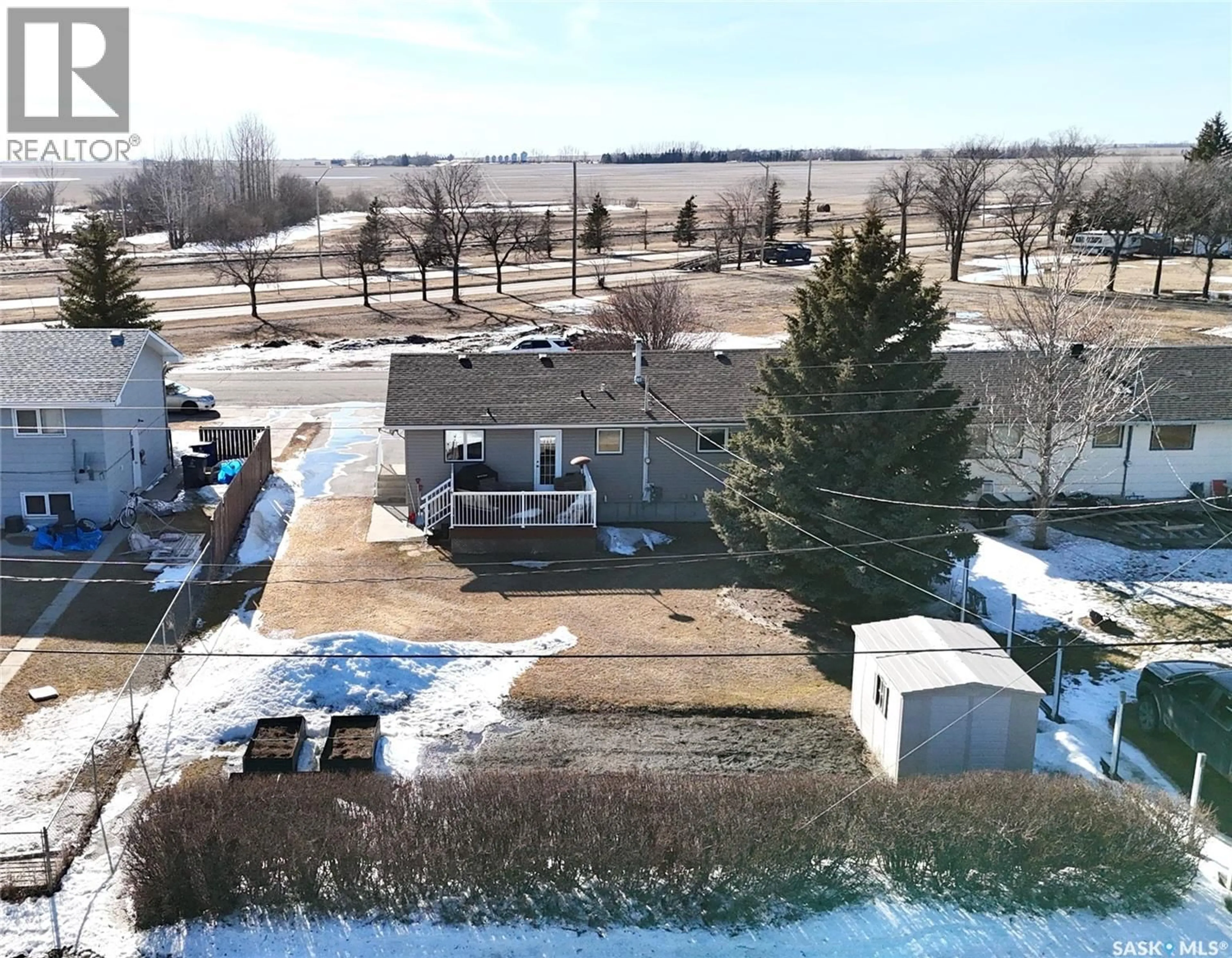 A pic from outside/outdoor area/front of a property/back of a property/a pic from drone, unknown for 102 GOVERNMENT ROAD, Davidson Saskatchewan S0G1A0