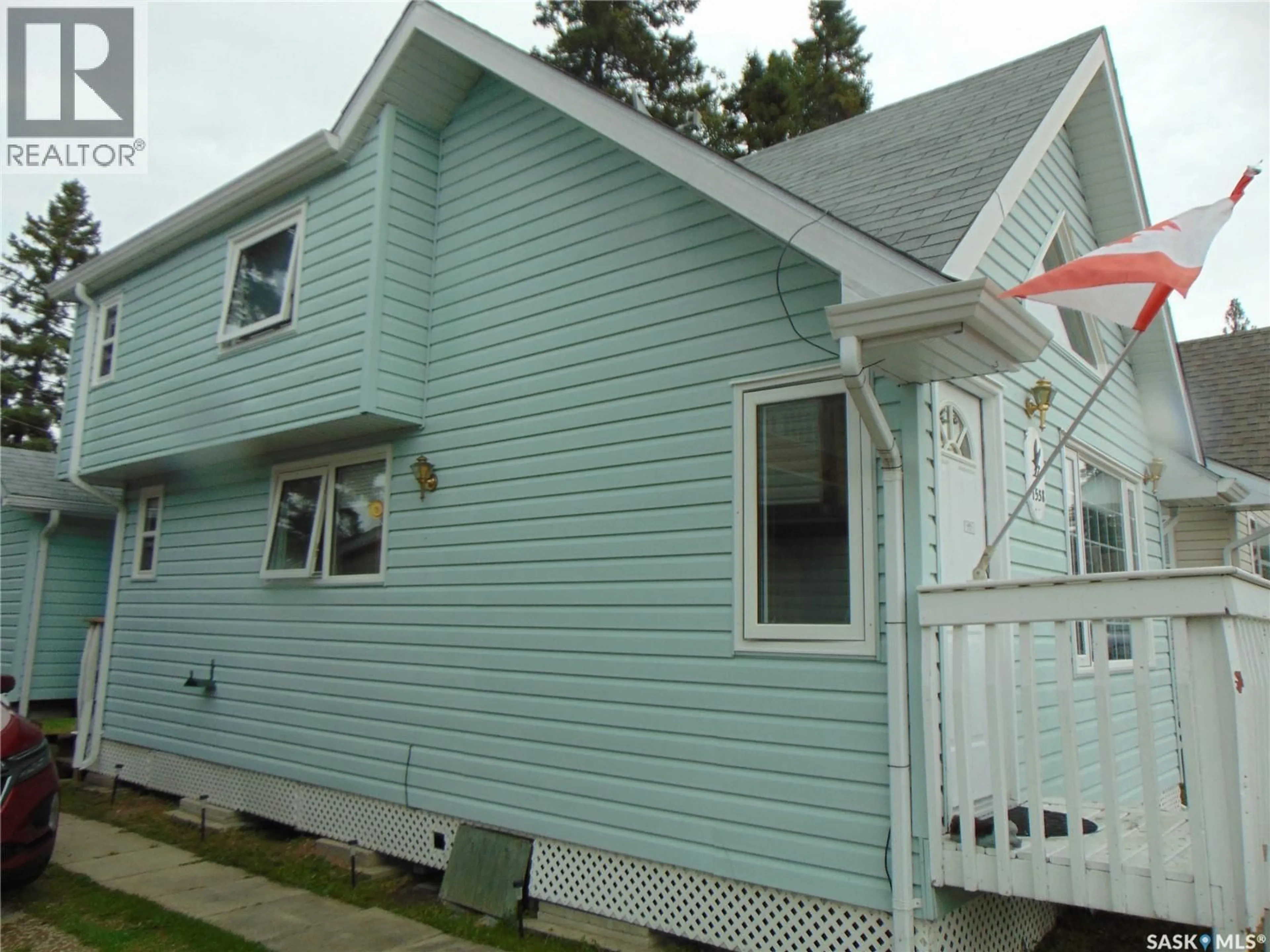 Home with vinyl exterior material, street for 1558 EAGLE STREET, Prince Albert National Park Saskatchewan S0J0N0