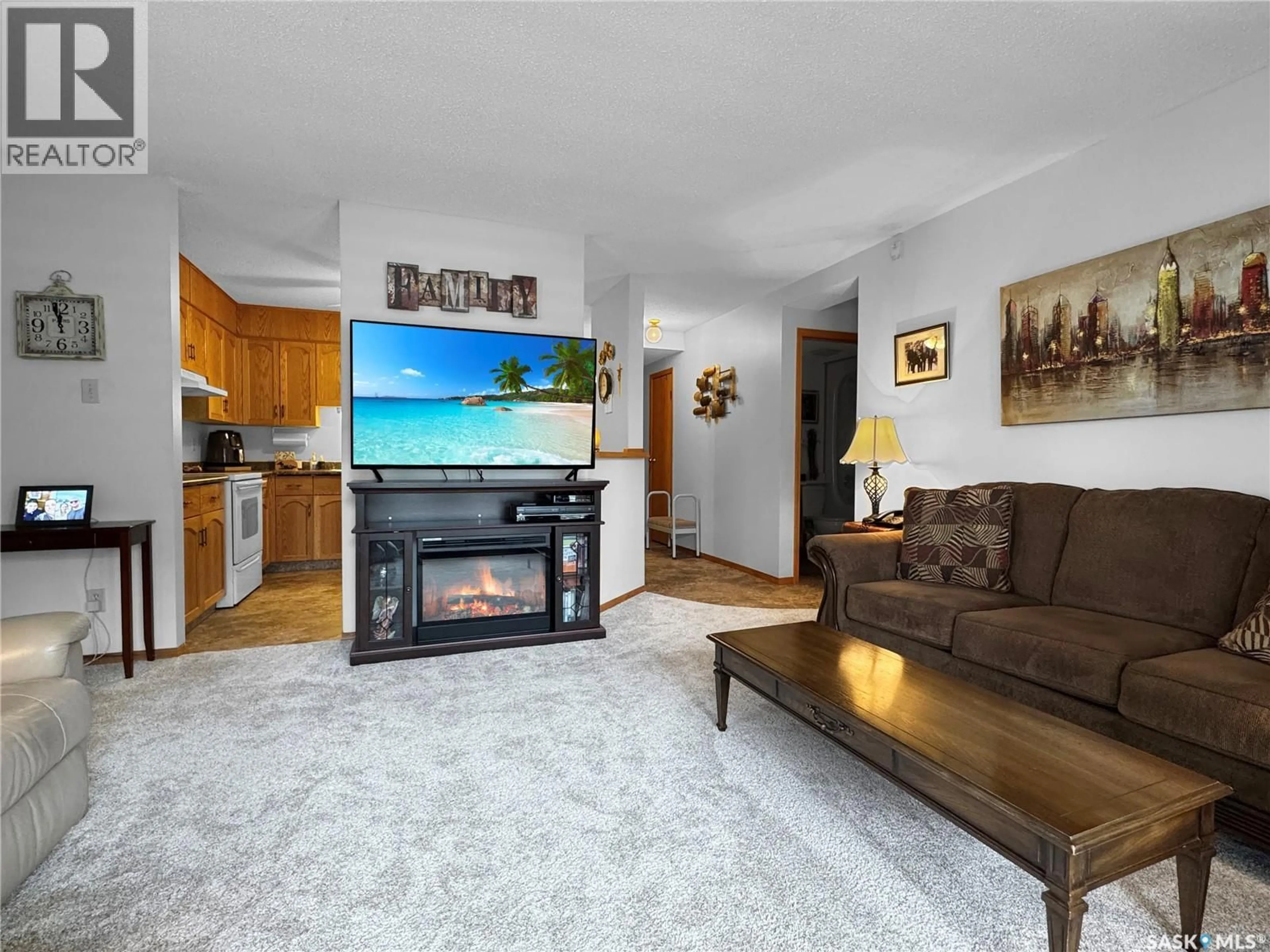 Living room with furniture, unknown for 110 - 1452 102ND STREET, North Battleford Saskatchewan S9A1G7