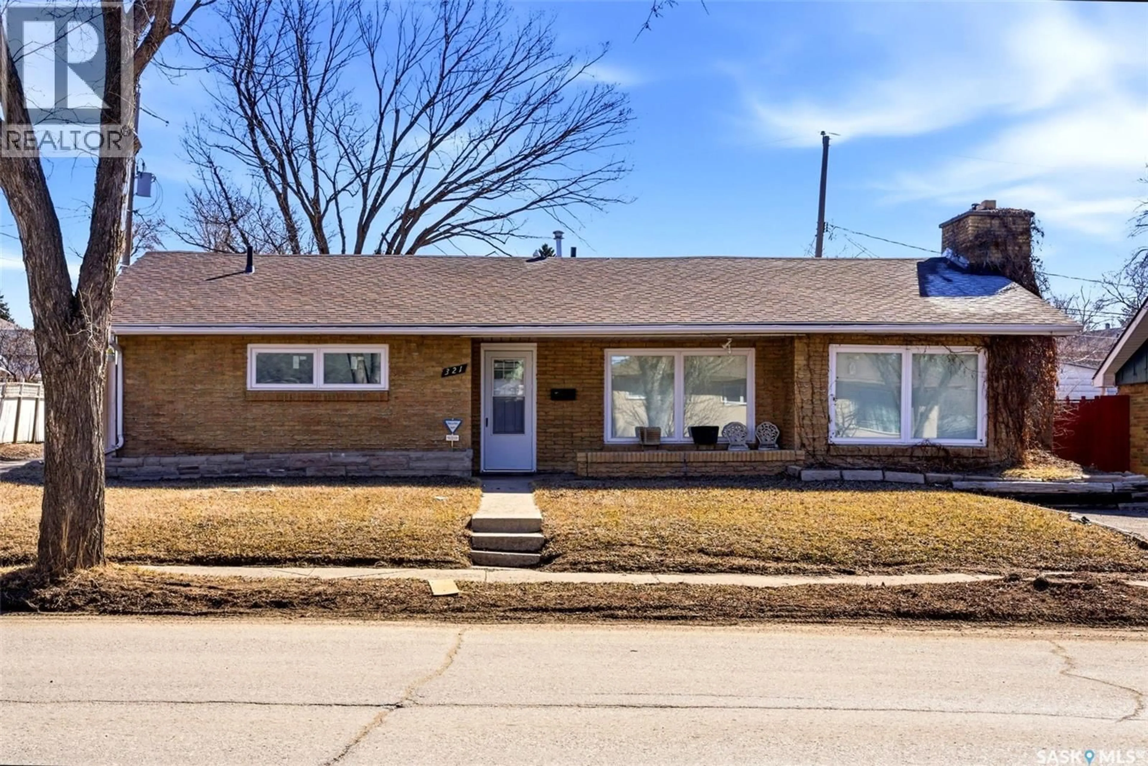 Home with brick exterior material, street for 321 ELPHINSTONE STREET, Regina Saskatchewan S4R3W7