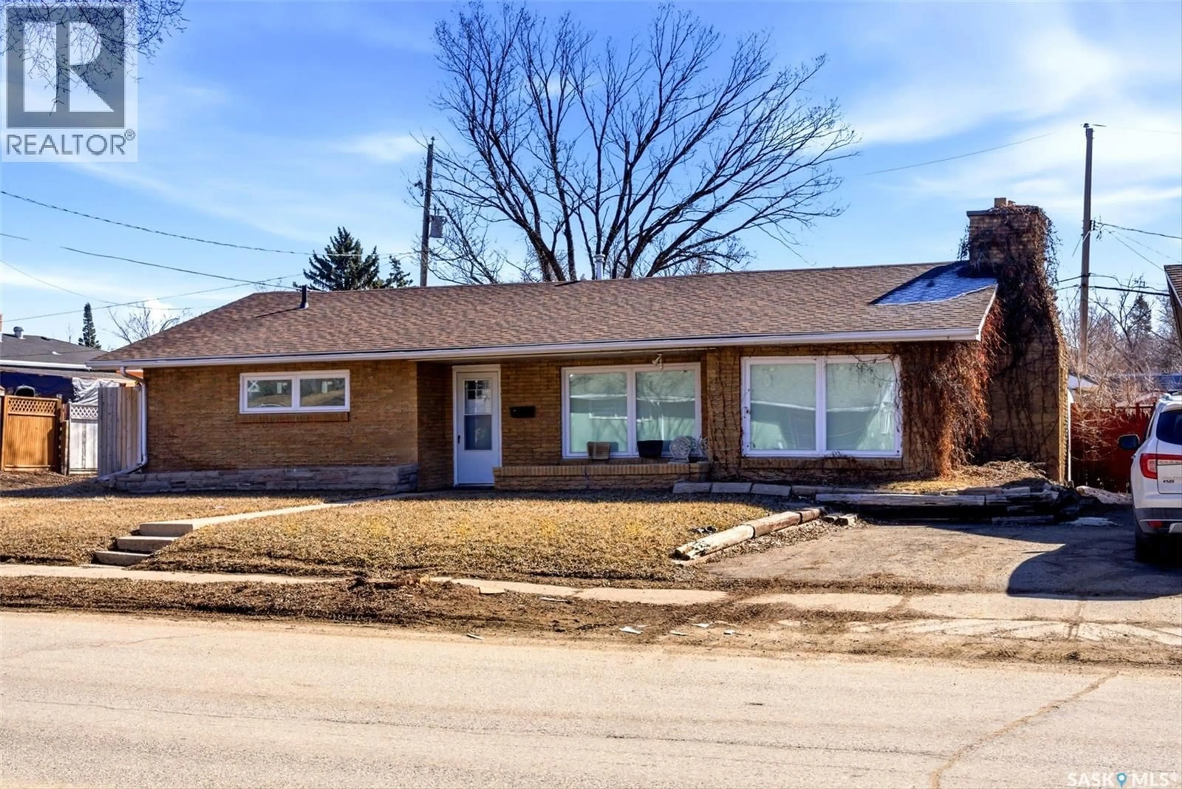 Home with brick exterior material, street for 321 ELPHINSTONE STREET, Regina Saskatchewan S4R3W7