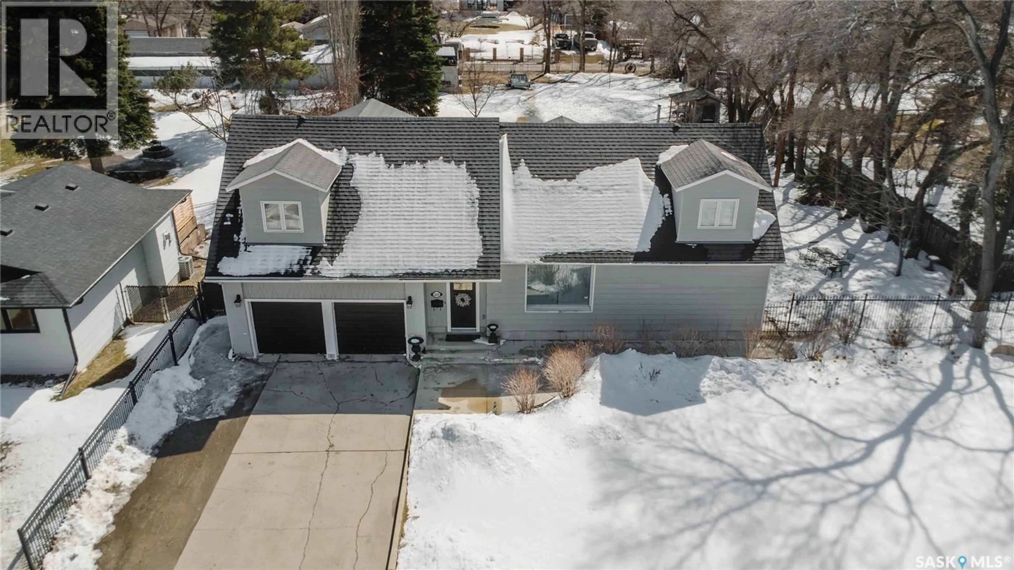 A pic from outside/outdoor area/front of a property/back of a property/a pic from drone, street for 3119 ORTONA STREET, Saskatoon Saskatchewan S7M3R3