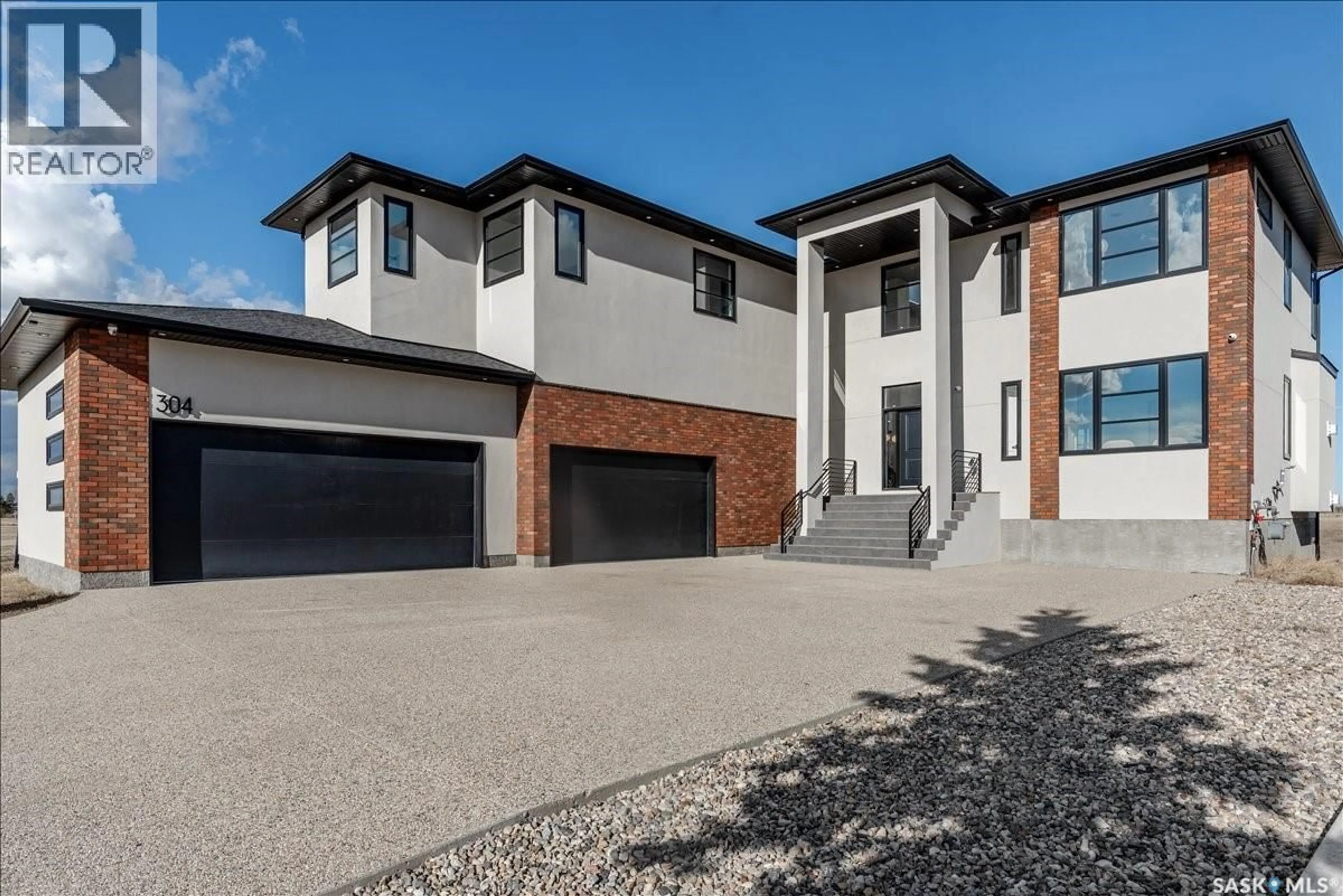 Home with brick exterior material, street for 304 SPRUCE CREEK CRESCENT, Edenwold Rm No.158 Saskatchewan S0G3Z0