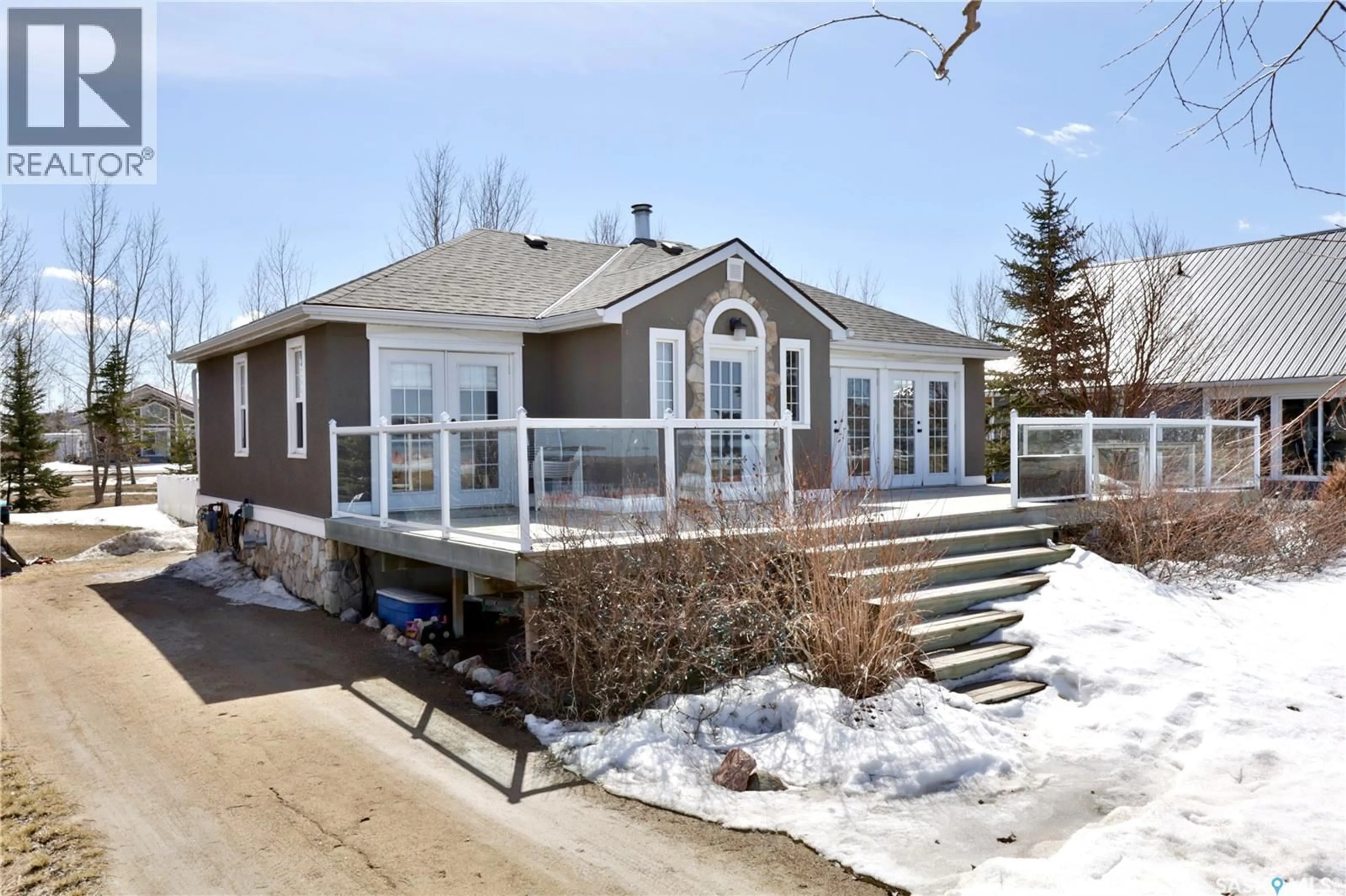 Home with vinyl exterior material, street for 17 POPLAR DRIVE, Katepwa Beach Saskatchewan S0G2K0