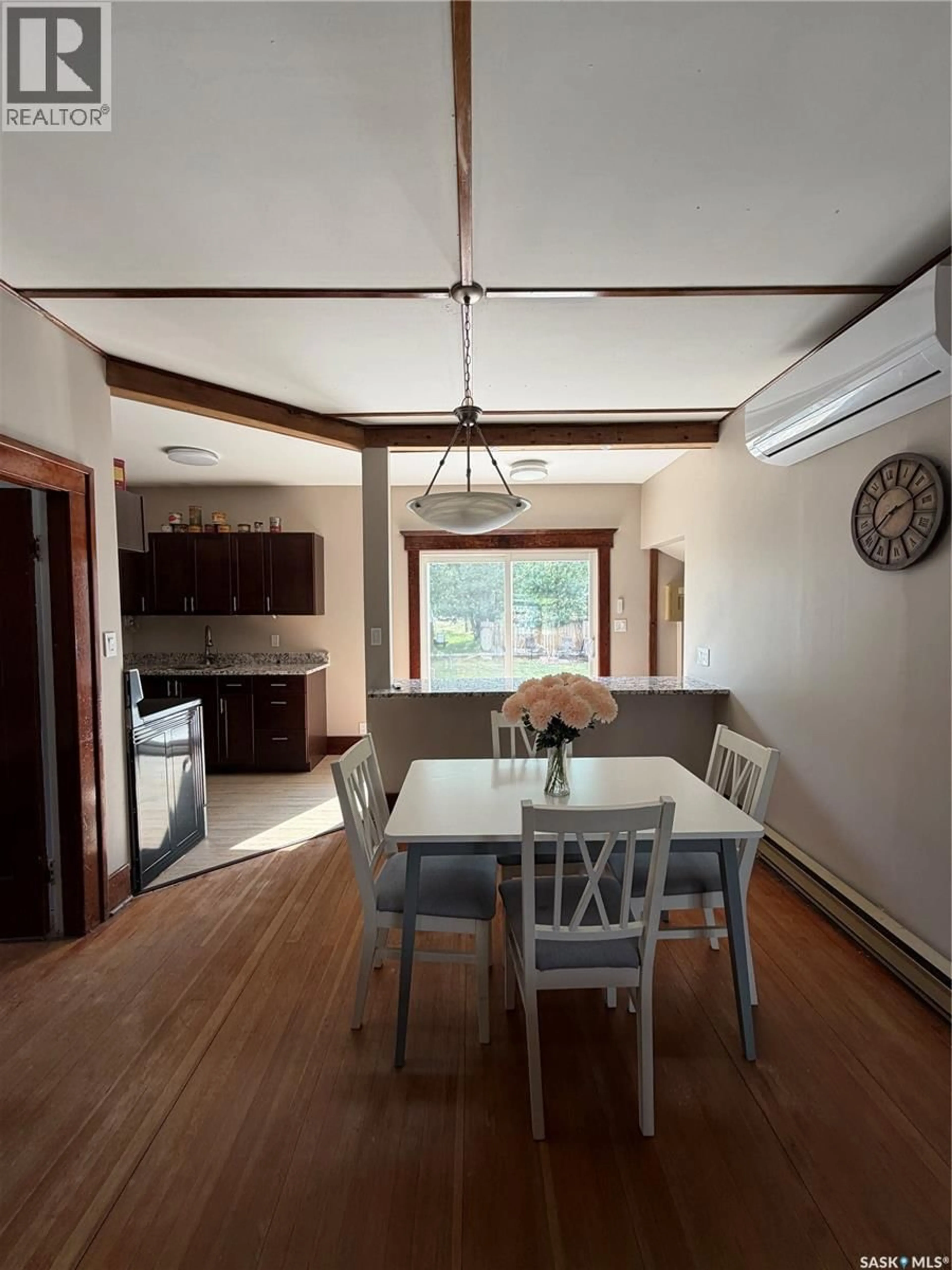 Dining room, wood/laminate floor for 107 MISTUSINNE STREET, Mistusinne Saskatchewan S0H1J0