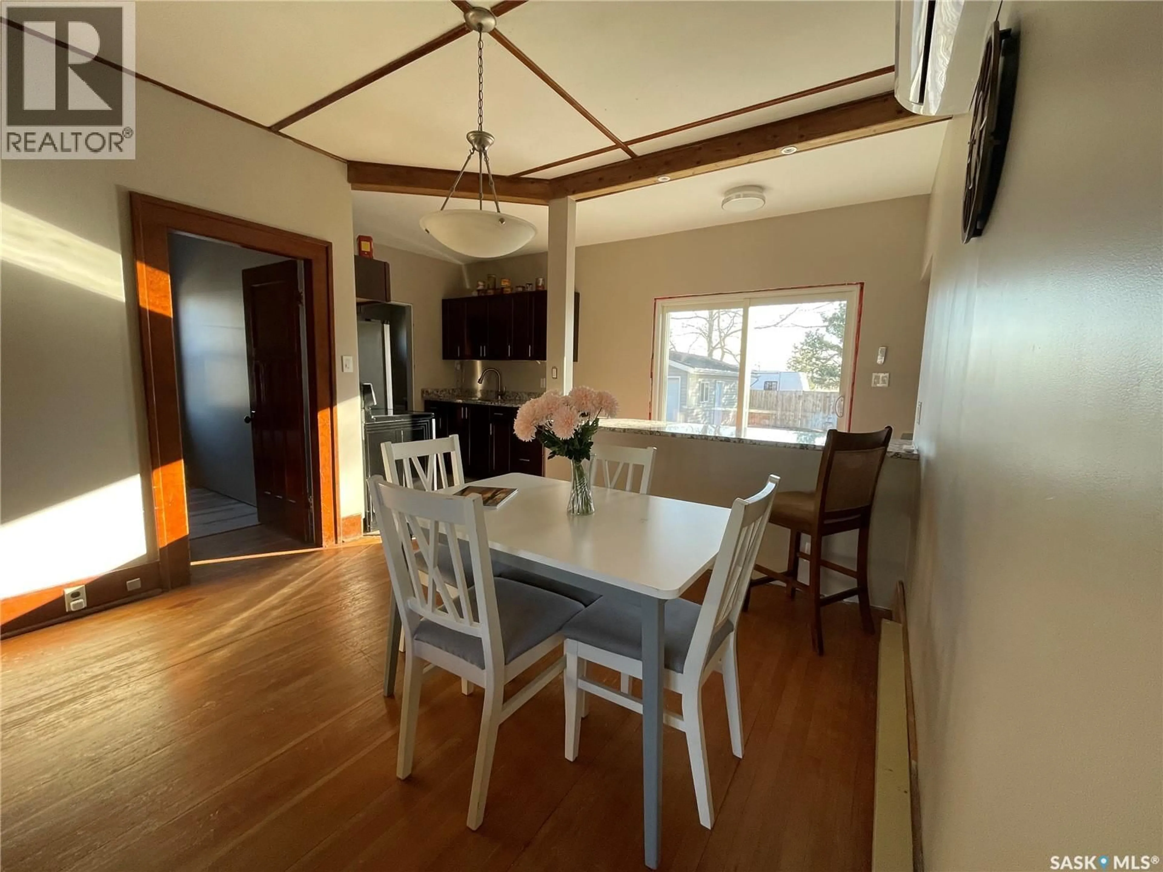 Dining room, wood/laminate floor for 107 MISTUSINNE STREET, Mistusinne Saskatchewan S0H1J0