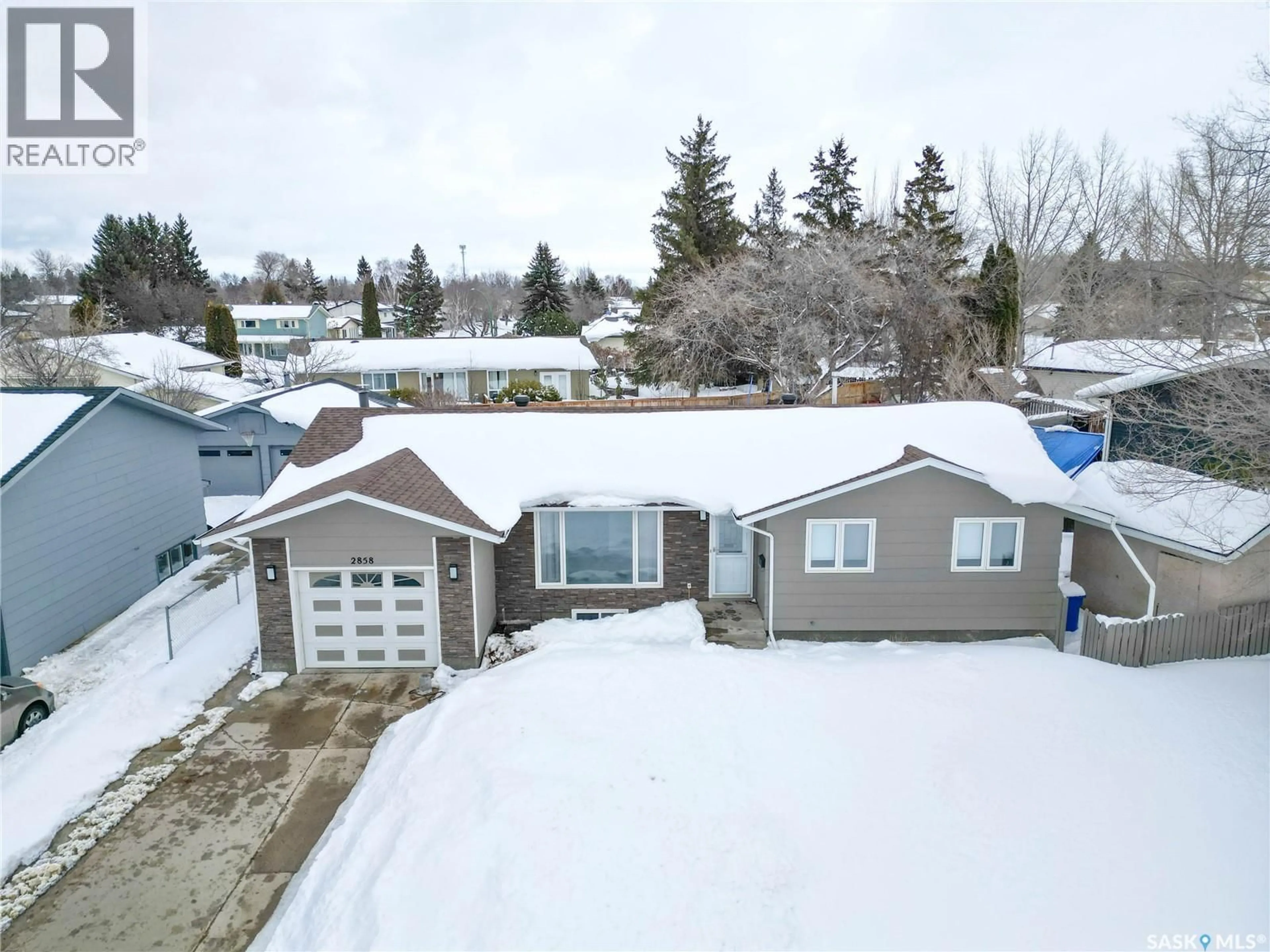 A pic from outside/outdoor area/front of a property/back of a property/a pic from drone, street for 2858 DUNN DRIVE, Prince Albert Saskatchewan S6V6K7