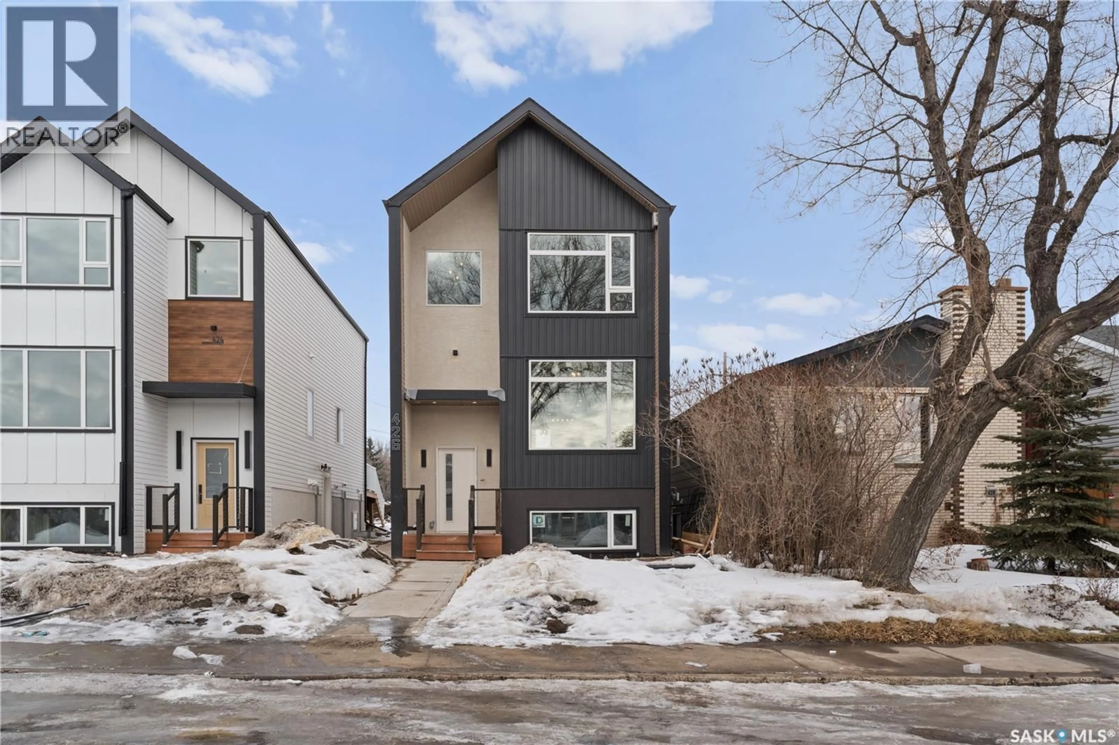 Home with brick exterior material, street for 426 EMPRESS STREET, Saskatoon Saskatchewan S7K0Y1