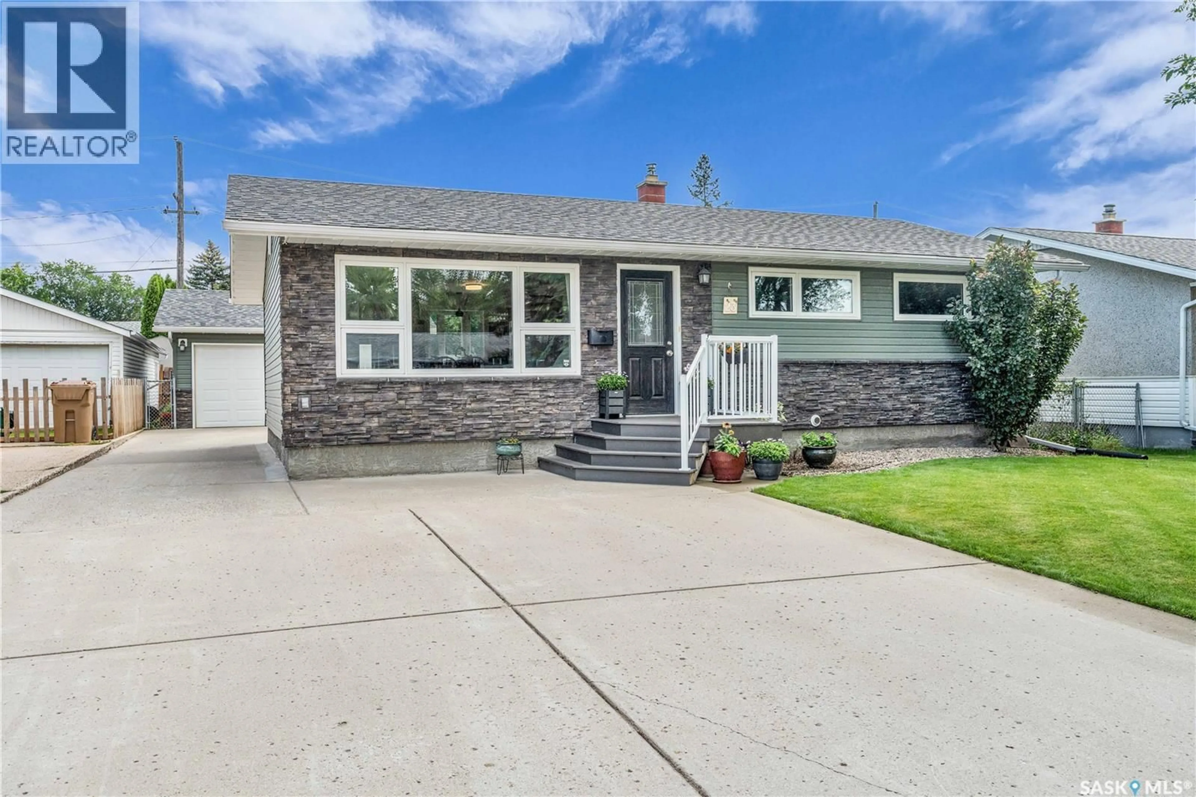 Home with vinyl exterior material, street for 23 ARMOUR STREET, Regina Saskatchewan S4R4G4