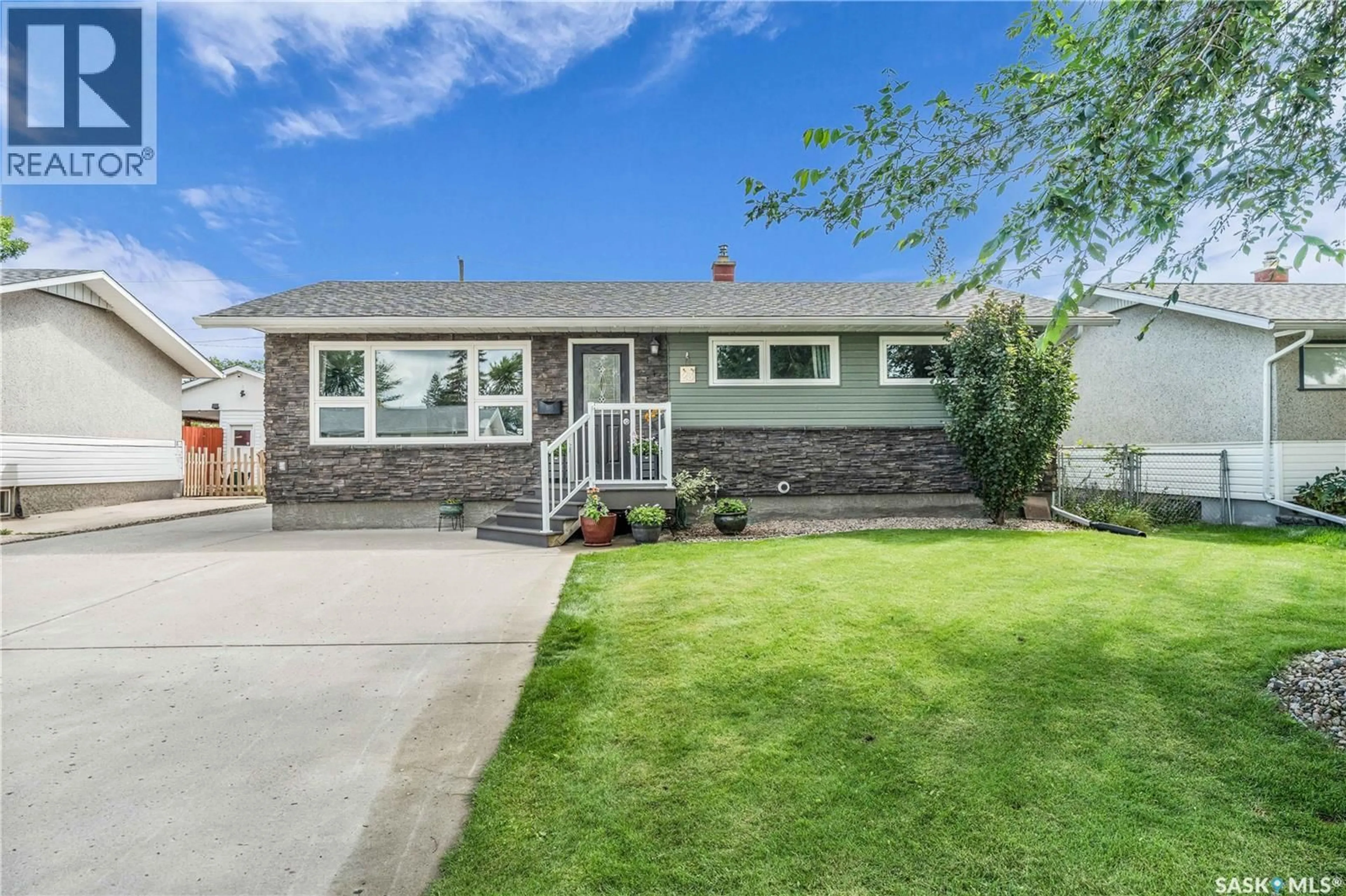 Home with vinyl exterior material, street for 23 ARMOUR STREET, Regina Saskatchewan S4R4G4