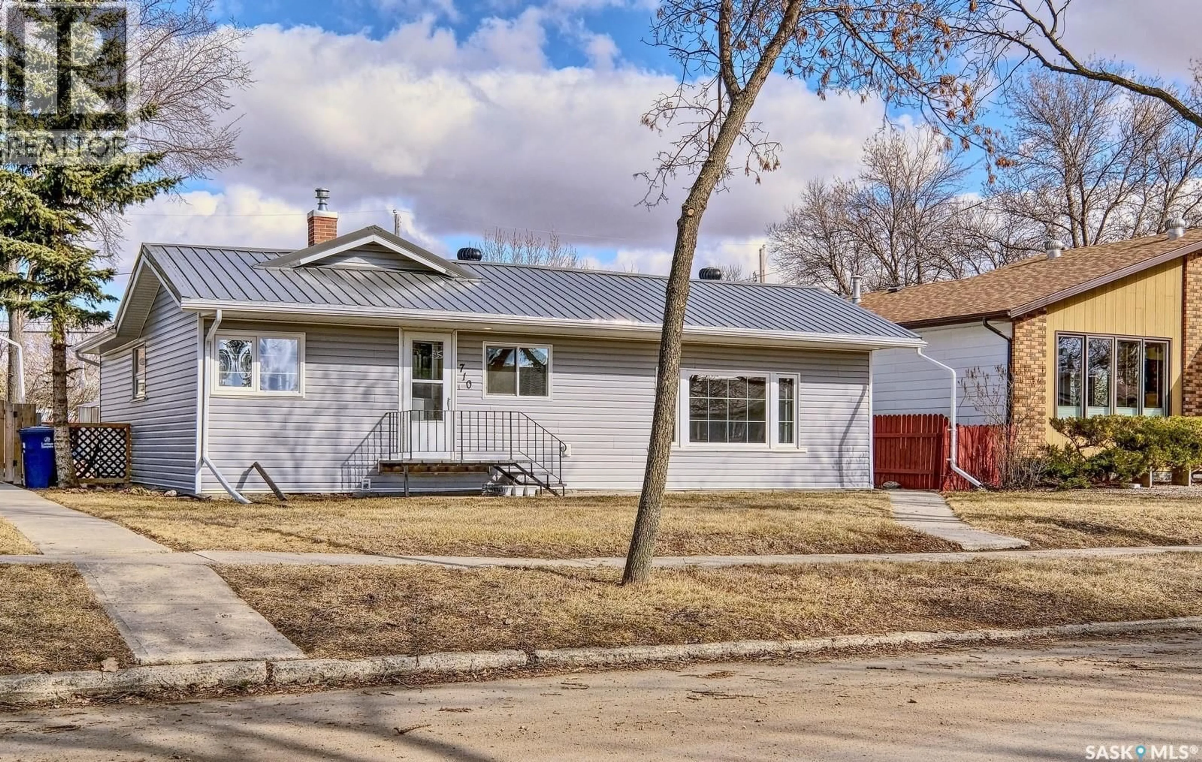 Home with vinyl exterior material, street for 710 MAIN STREET, Rosetown Saskatchewan S0L2V0