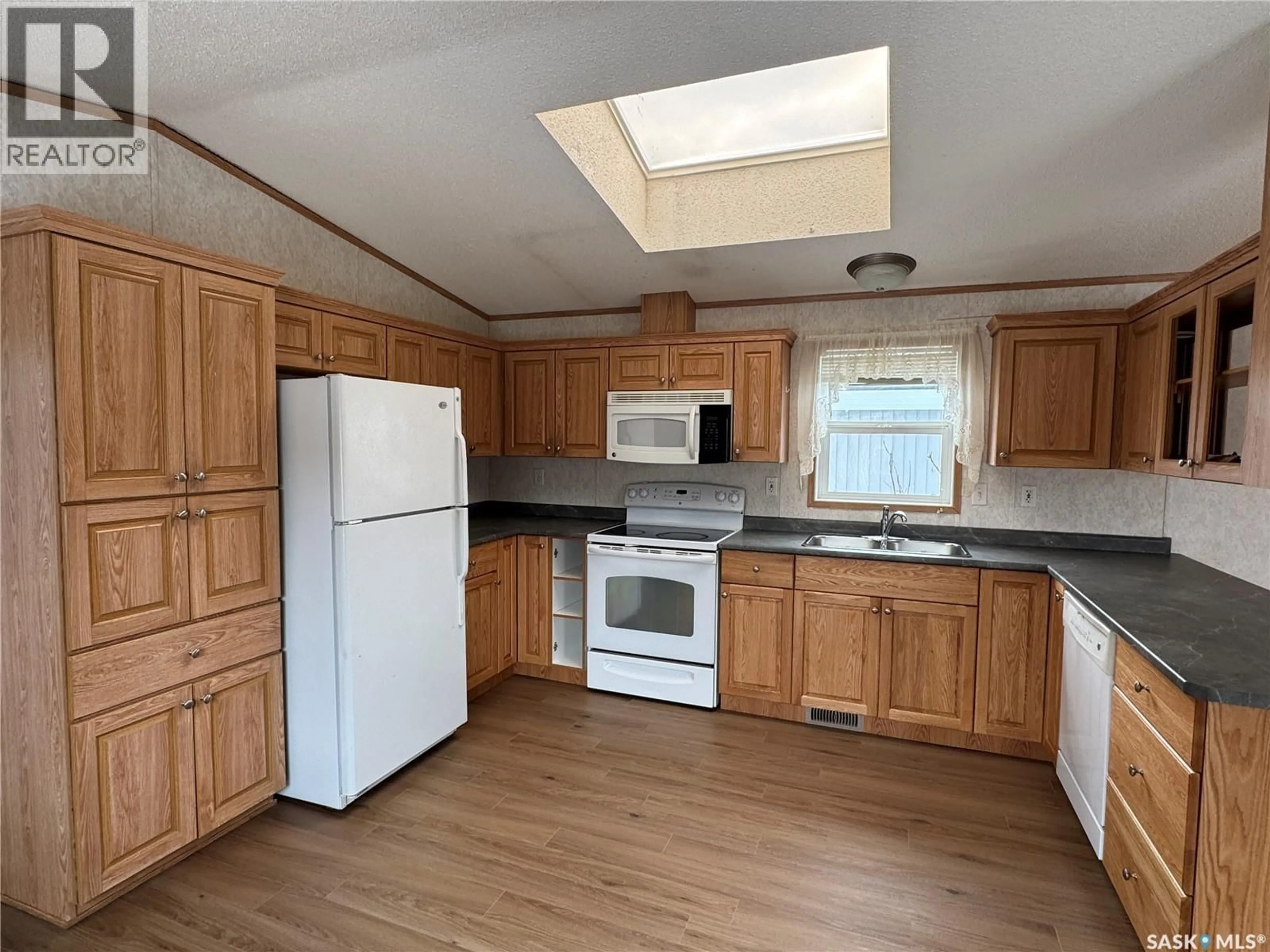 Standard kitchen, wood/laminate floor for 214 14TH STREET, Humboldt Saskatchewan S0K2A0