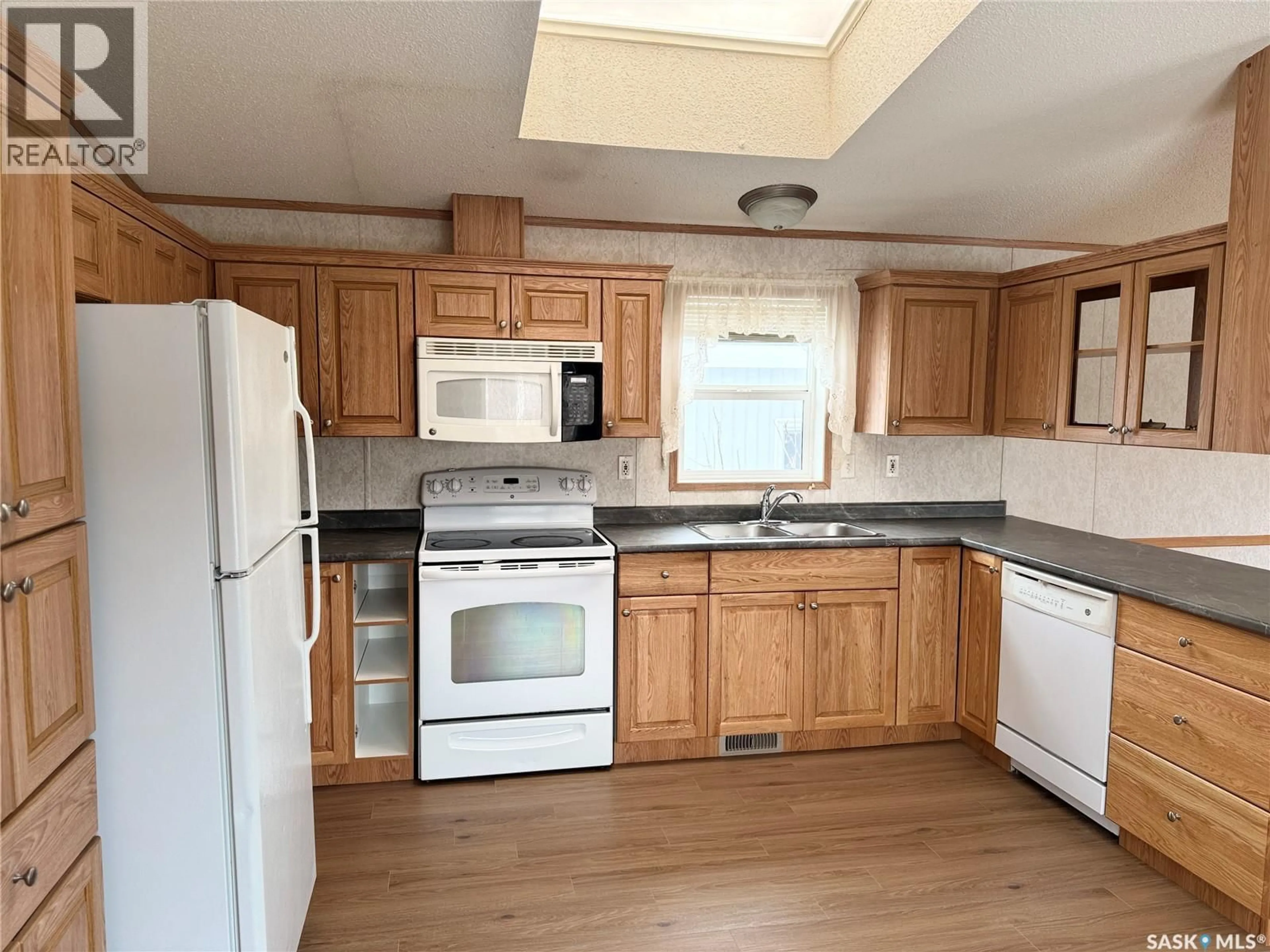 Standard kitchen, wood/laminate floor for 214 14TH STREET, Humboldt Saskatchewan S0K2A0