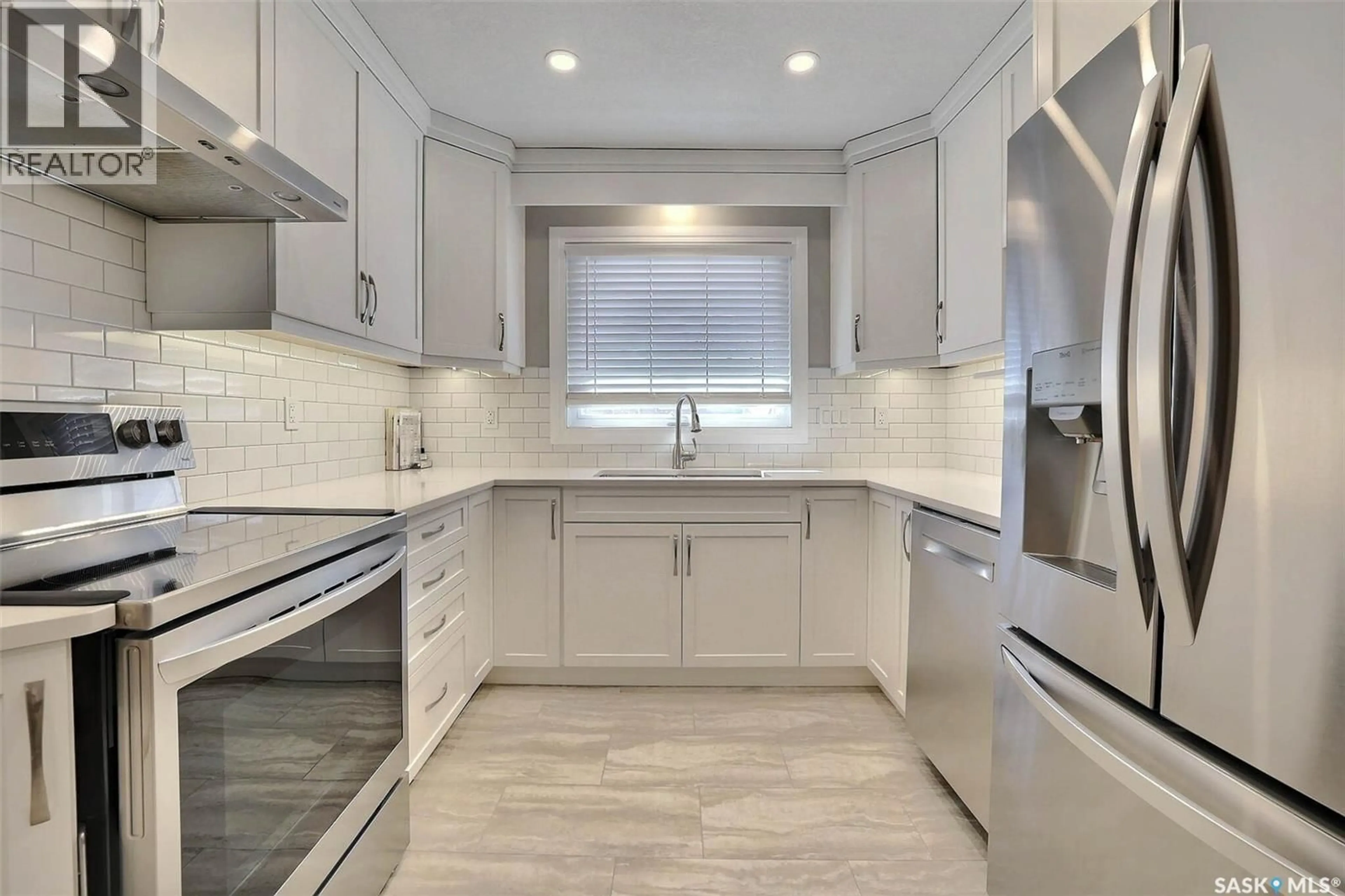 Contemporary kitchen, ceramic/tile floor for 7314 BOWMAN AVENUE, Regina Saskatchewan S4T6K8