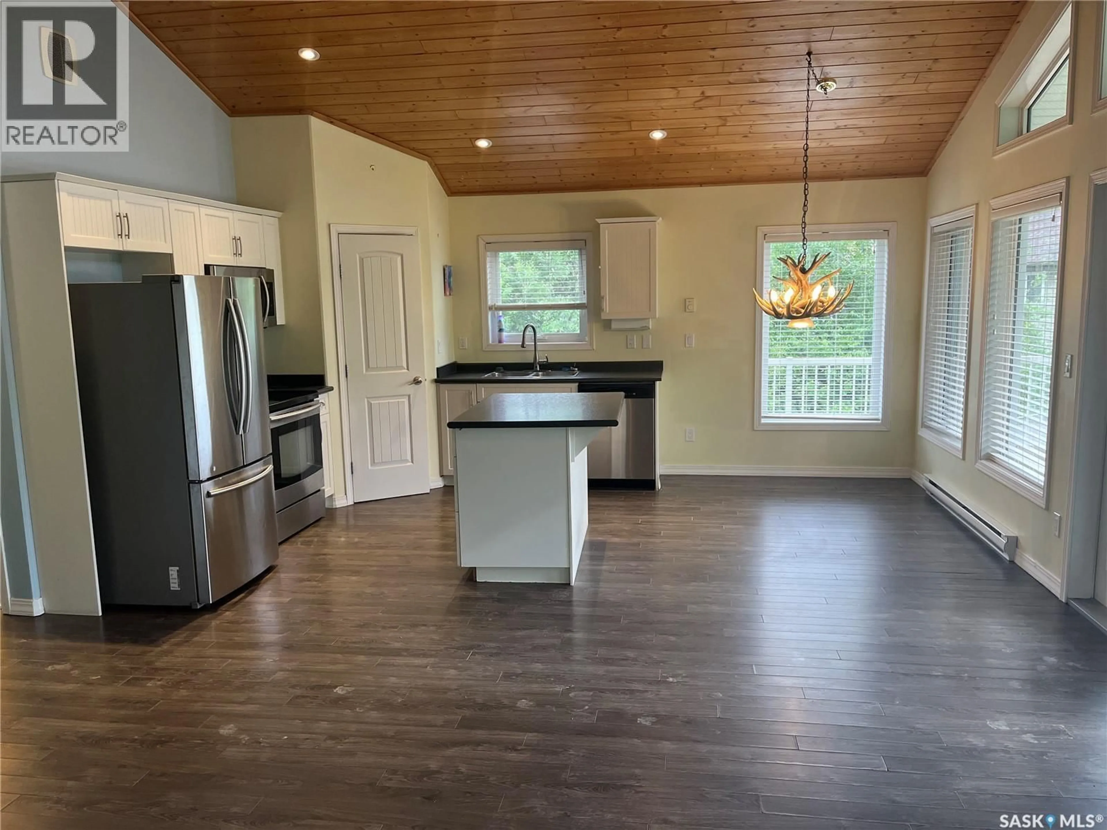 Open concept kitchen, wood/laminate floor for 9 TRANQUILITY PLACE, Big River Rm No. 555 Saskatchewan S0J0E0